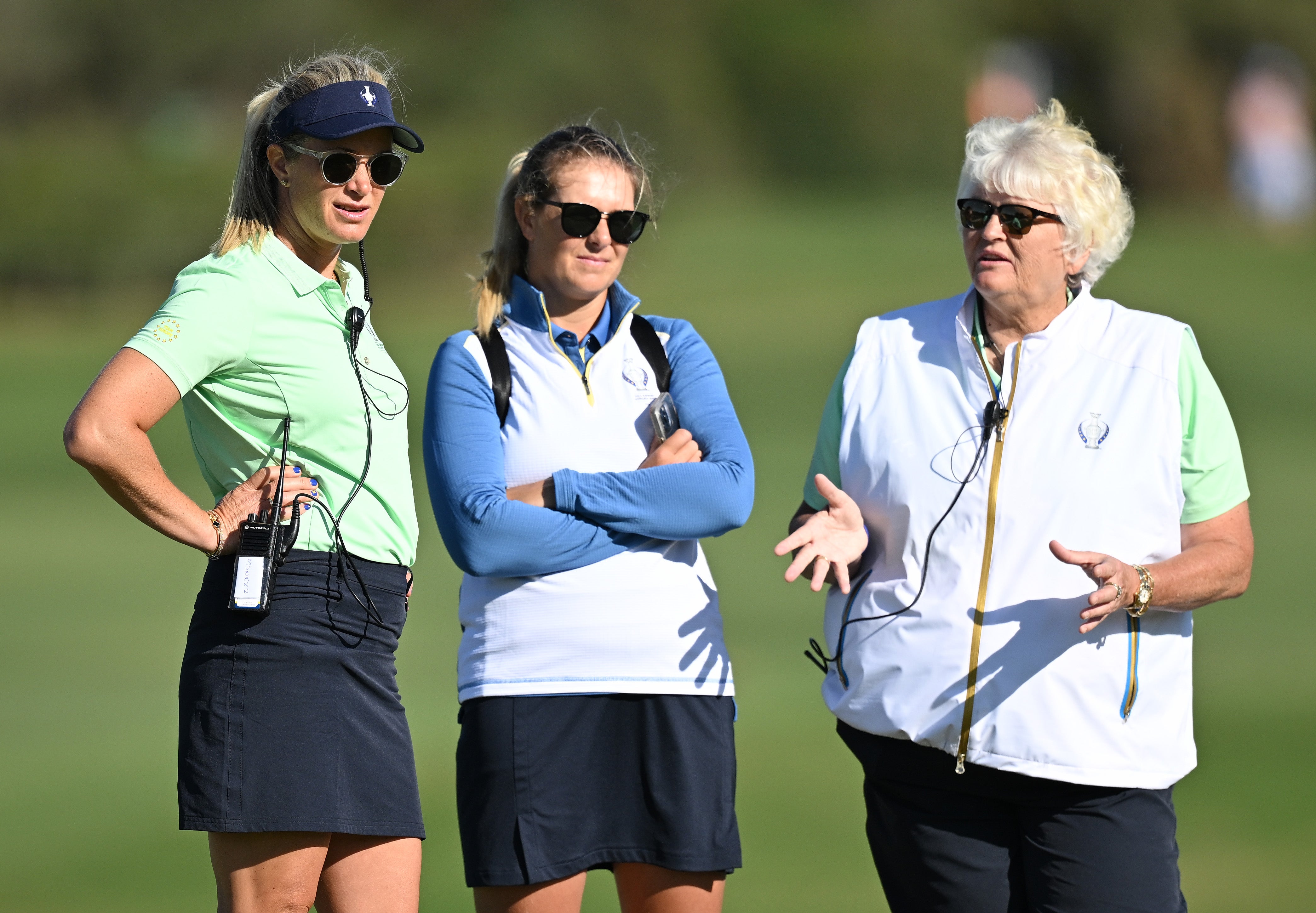 Suzann Pettersen, captain of team Europe talks with her assistant Dame Laura Davies during practice