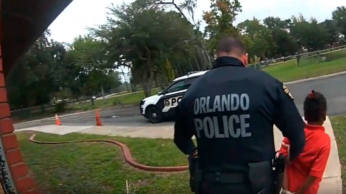 Kaia Rolle, 6, being escorted by police out of her school under arrest