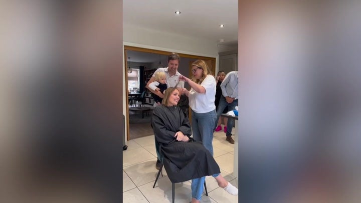 Watch: Strictly’s Amy Dowden’s family help her shave head amid cancer battle