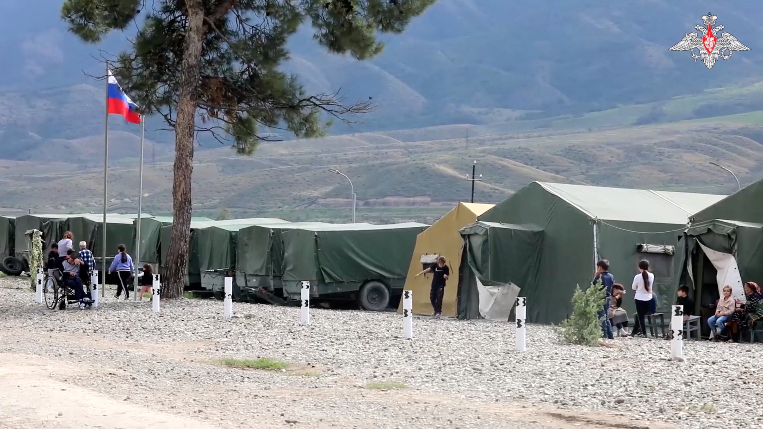 Civilians evacuated by Russian peacekeepers in a camp in Nagorno-Karabakh