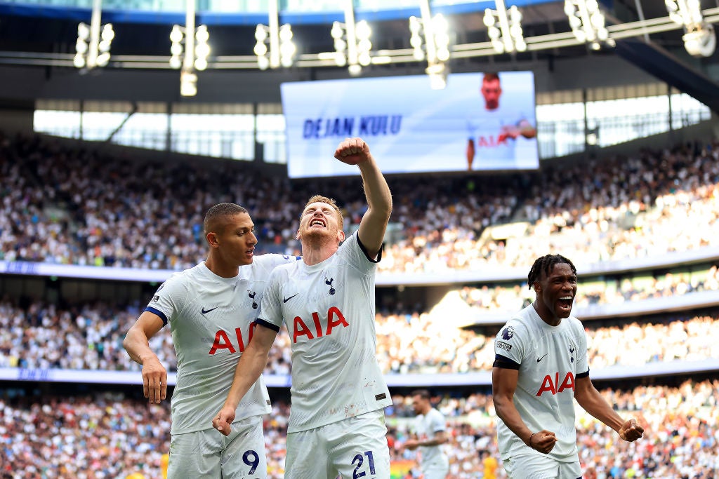 Dejan Kulusevski celebrates with teammates Richarlison and Destiny Udogie after their comeback victory against Sheffield United