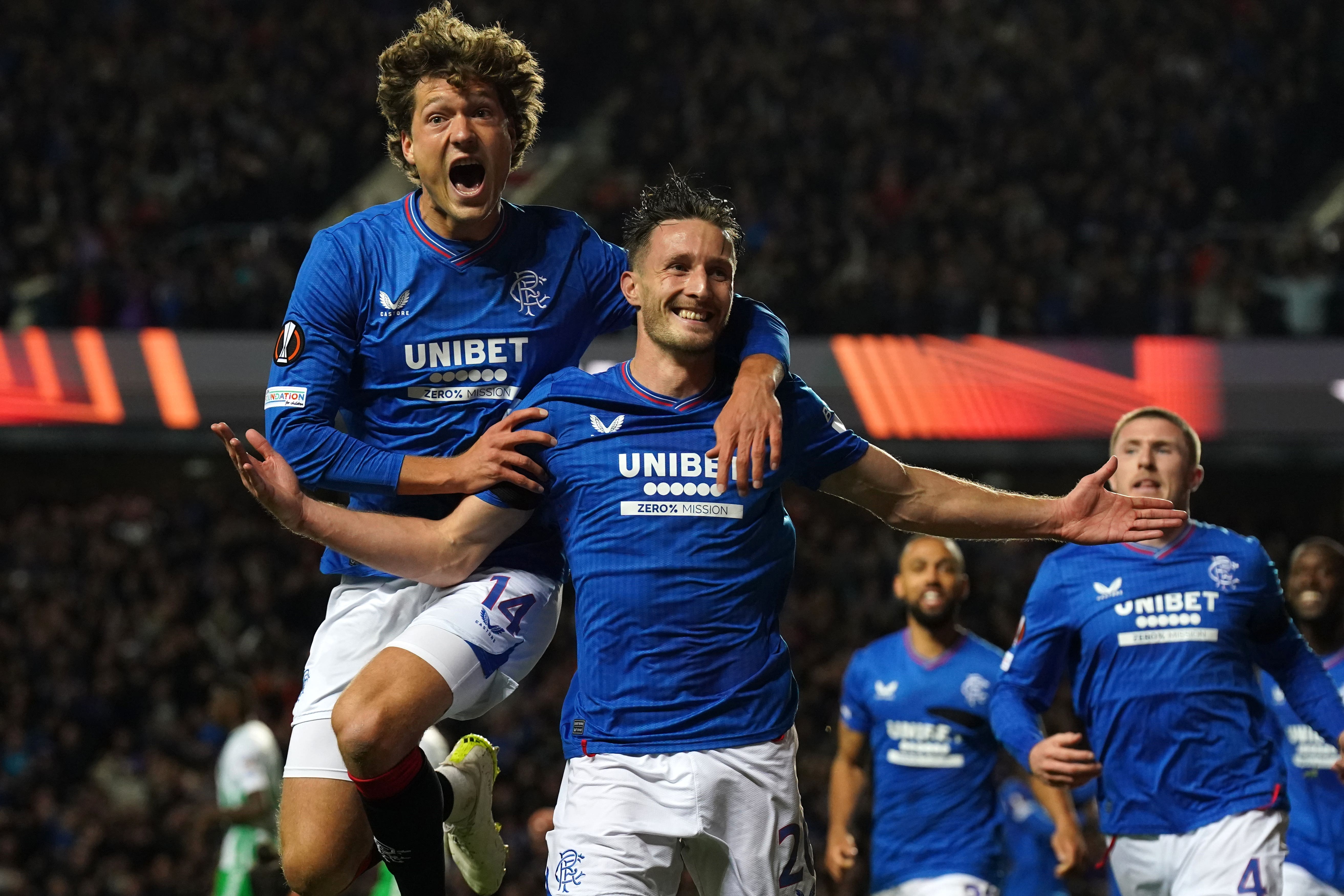 Rangers’ Sam Lammers and Ben Davies celebrate after Abdallah Sima scores (Andrew Milligan/PA)