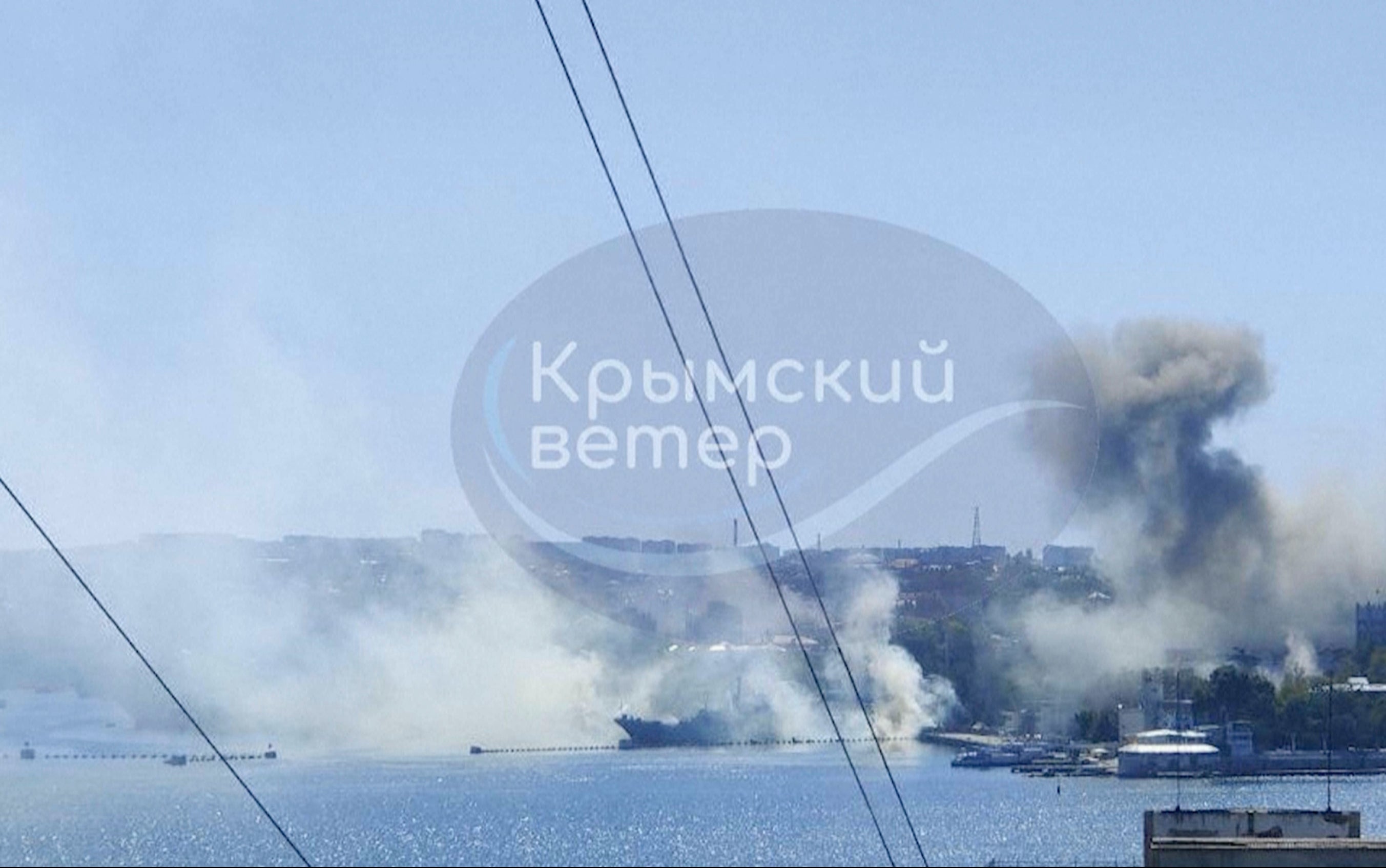 Smoke can be seen rising from the headquarters of Russia’s Black Sea fleet in Sevastopol after the attack on Friday