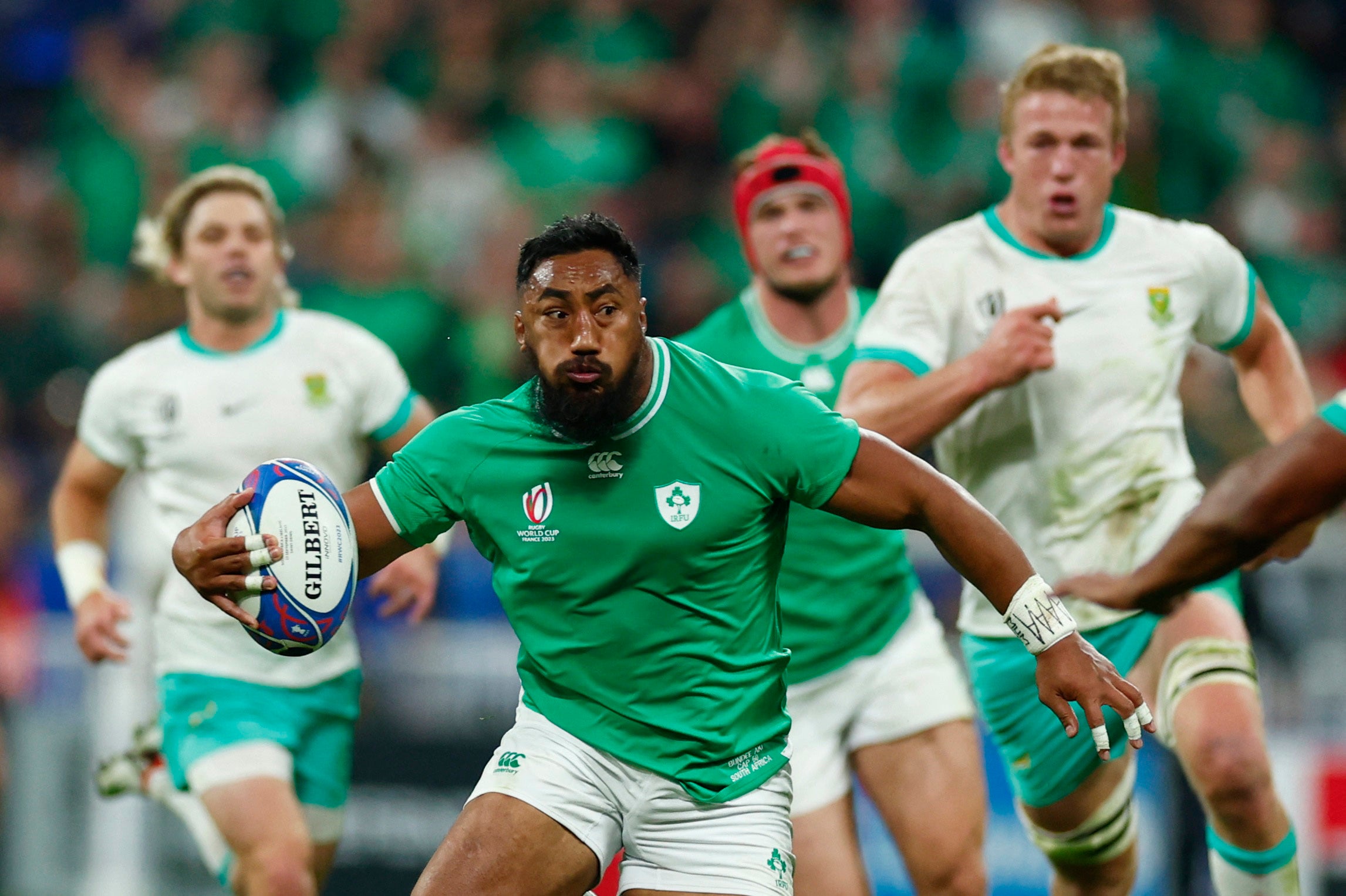 Bundee Aki charges forwards with the ball in hand