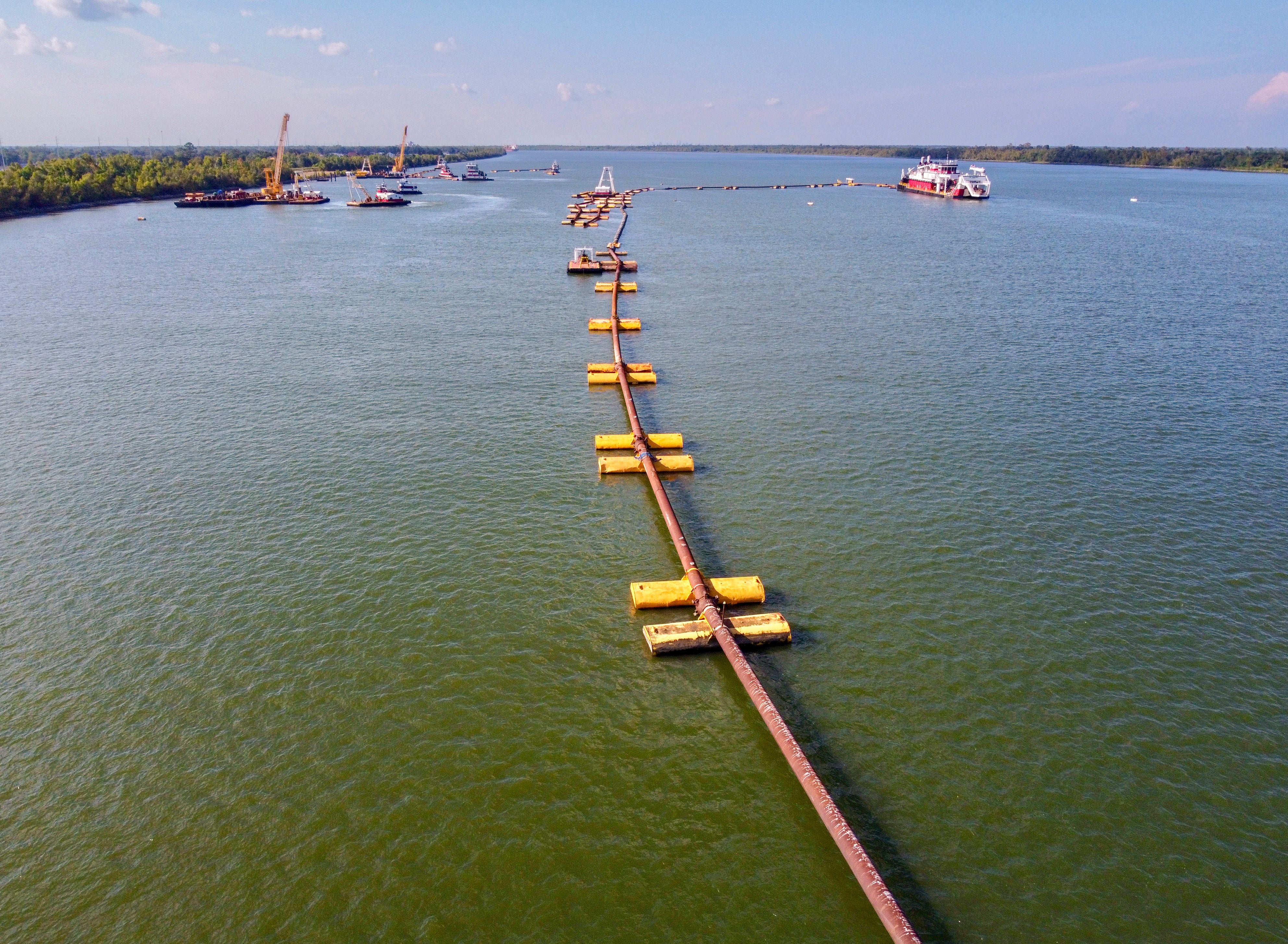 The Army Corps of Engineers is finishing a 25-foot underwater levee in the Mississippi in an attempt to prevent saltwater from contaminating drinking supplies