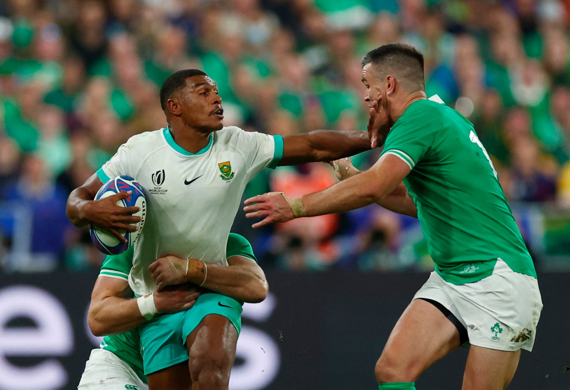 South Africa's Damian Willemse in action with Ireland's Johnny Sexton