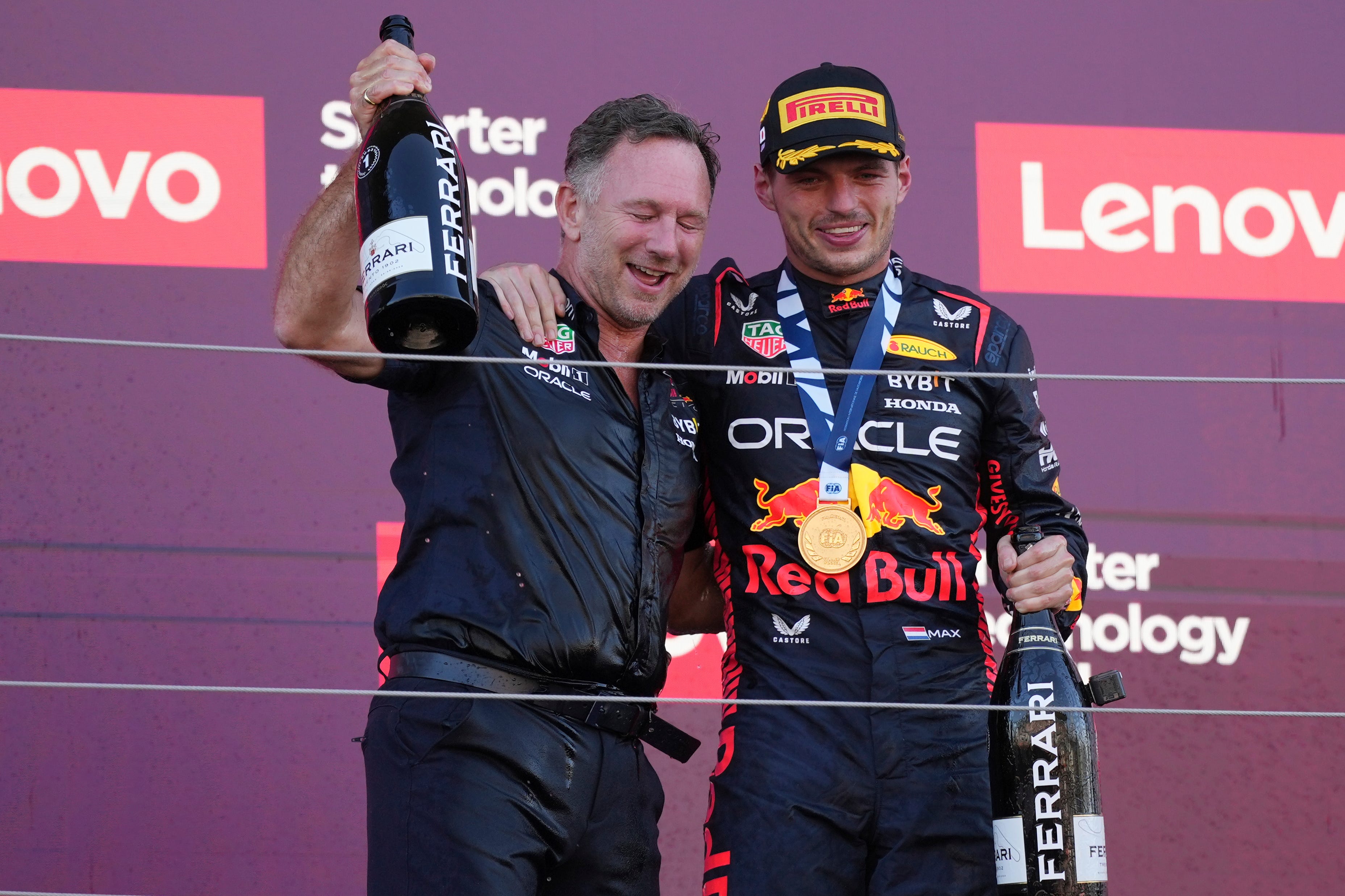 Christian Horner, left, and Max Verstappen after winning the Japanese Grand Prix (AP Photo/Toru Hanai)