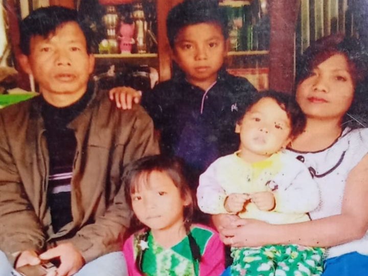 Joshua Hangsing and his wife Meena with their son Tonsing (centre) and two other children