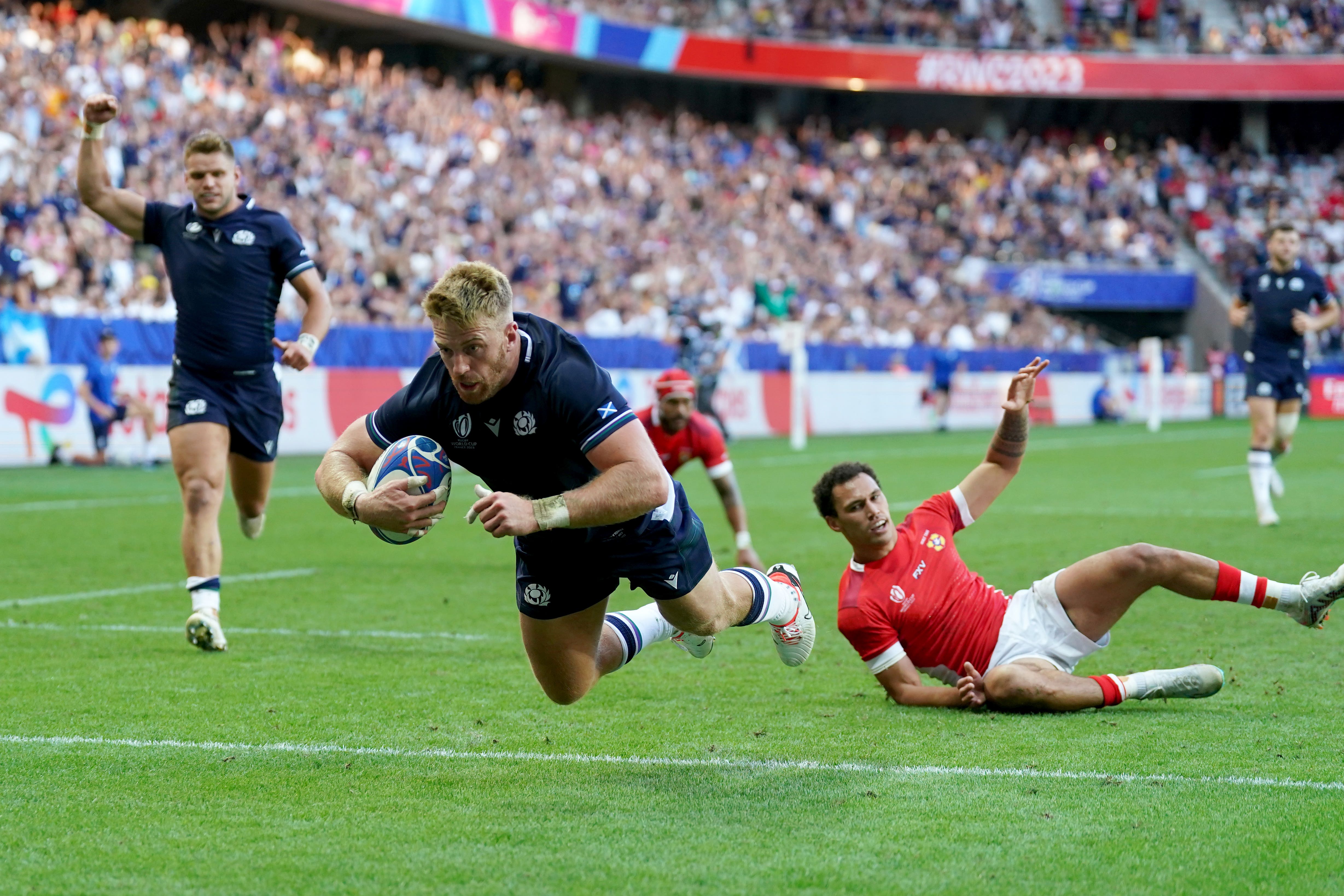 Kyle Steyn scores Scotland’s third try against Tonga (Adam Davy/PA)