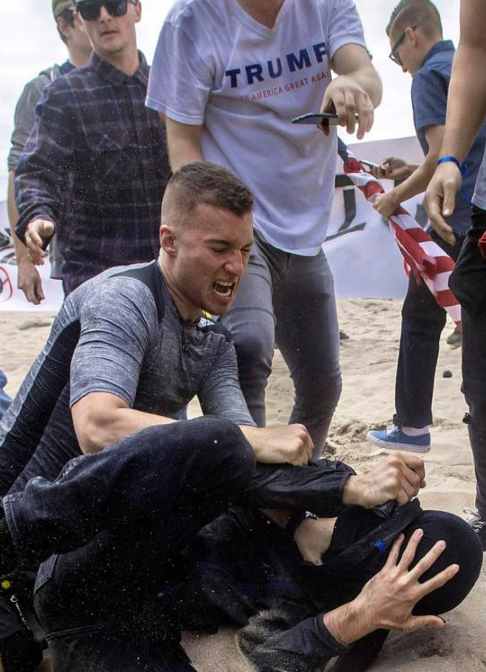 Robert Rundo, among the chief organizers in a movement of white supremacist ‘active clubs’, was pictured attacking counter protesters at a rally in California in 2017