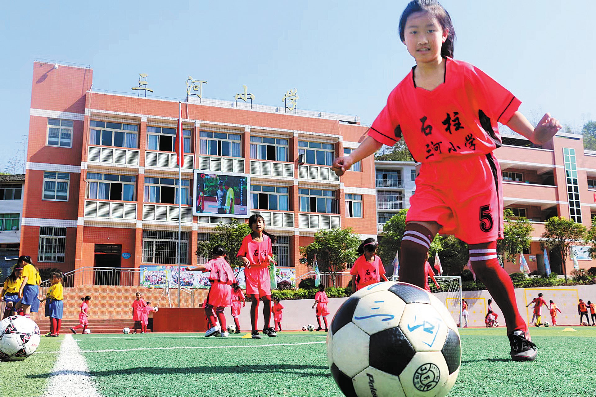 Members of the team train at the school