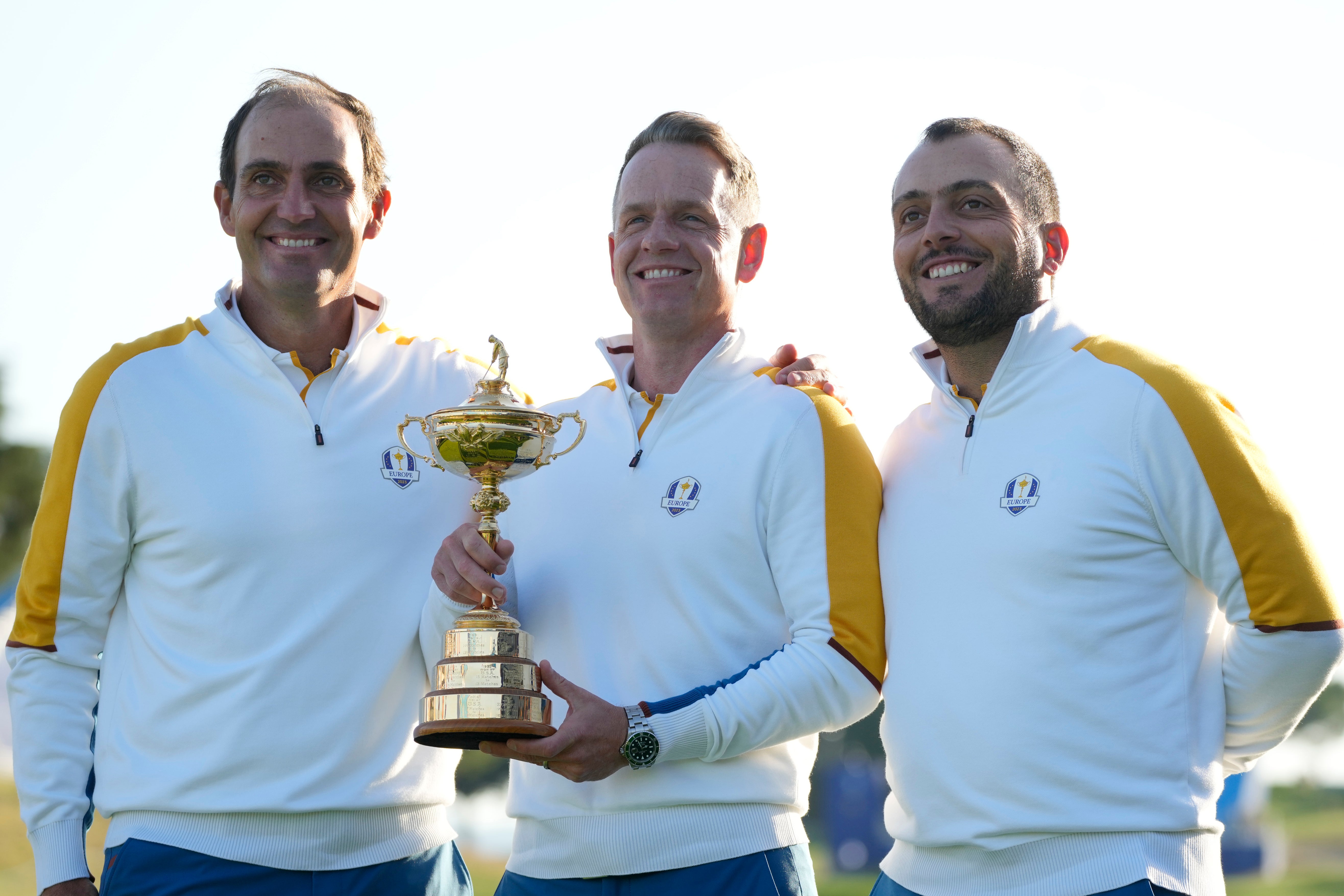 Edoardo Molinari, left, with captain Donald and fellow vice-captain Francesco Molinari