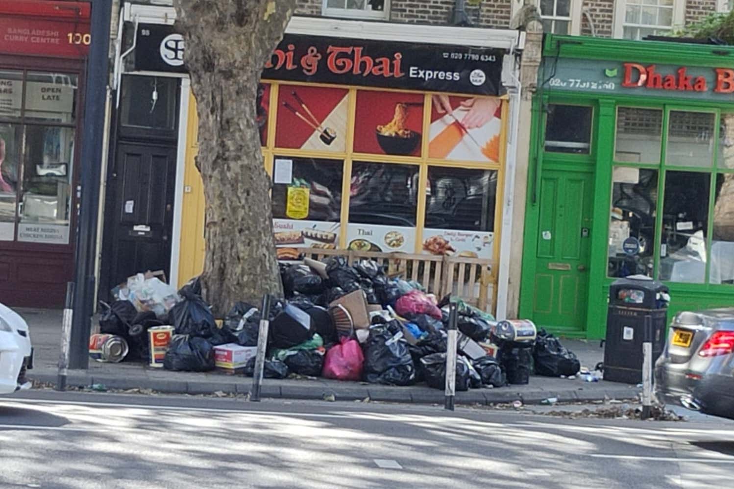 Rubbish piled up on a street in Tower Hamlets (Boyana Damyanova/PA)