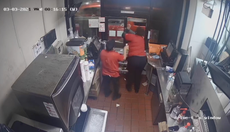 Fast food worker shoots at pregnant customer through drive-thru window in fight over curly fries