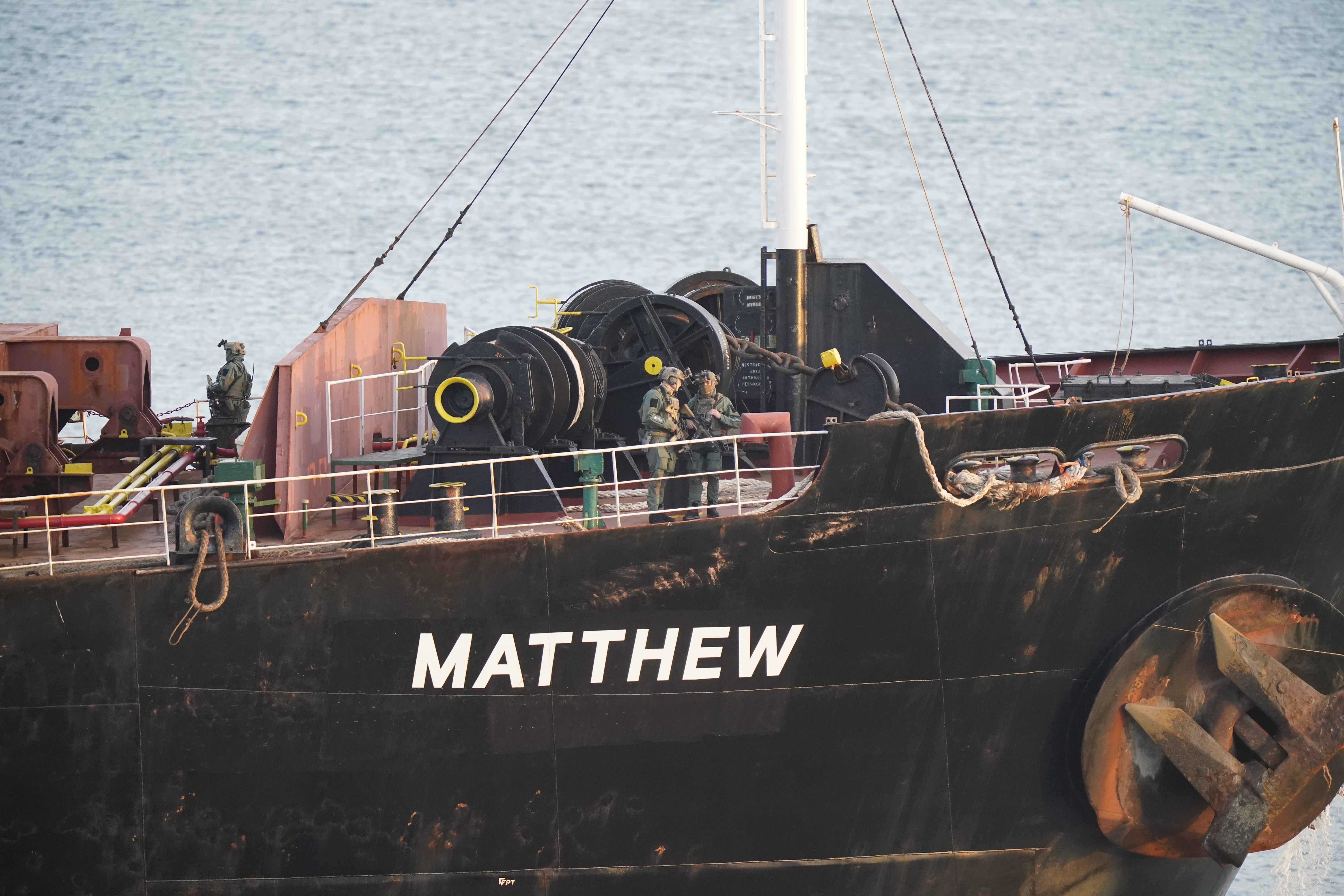 Military personnel after boarding the MV Matthew cargo vessel (Niall Carson/PA)