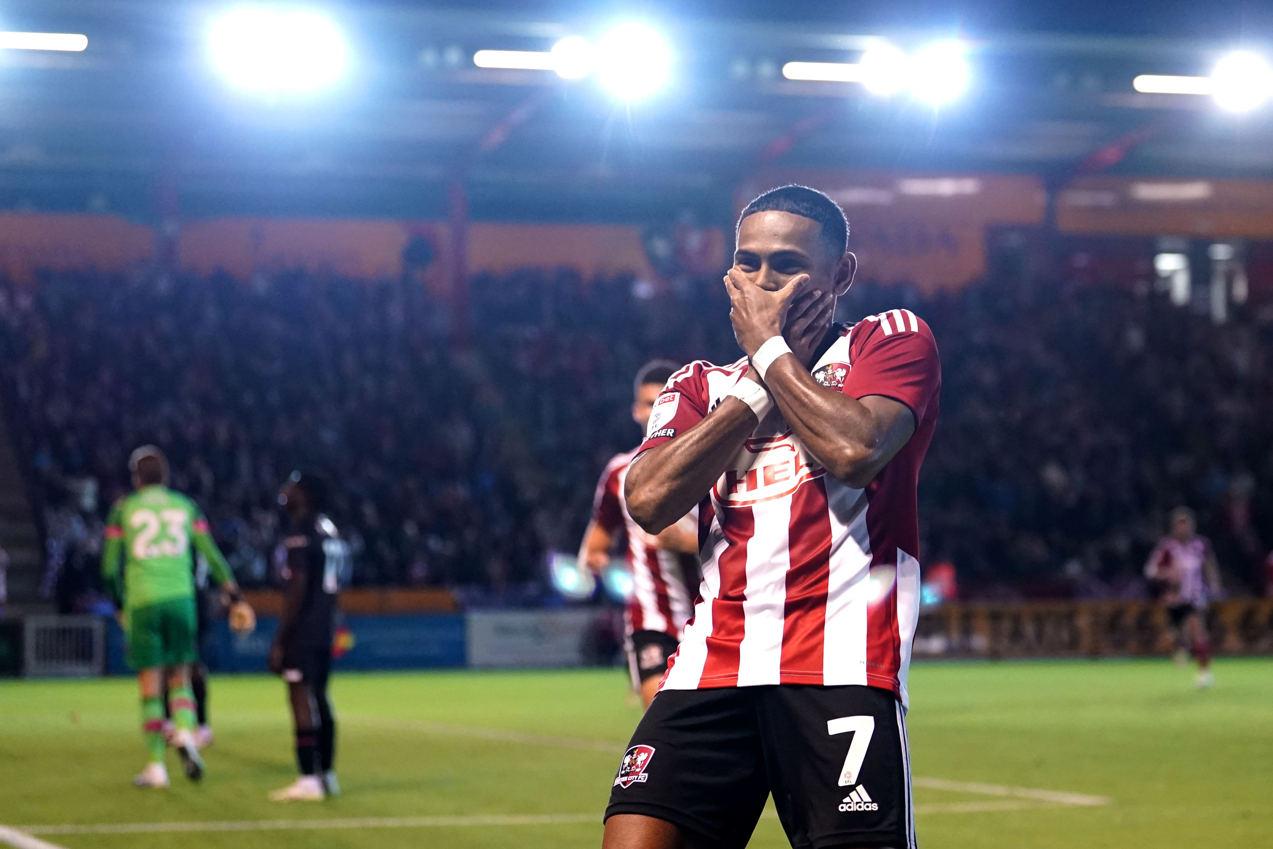 Exeter’s Demetri Mitchell celebrates his winner against Luton (Andrew Matthews/PA).