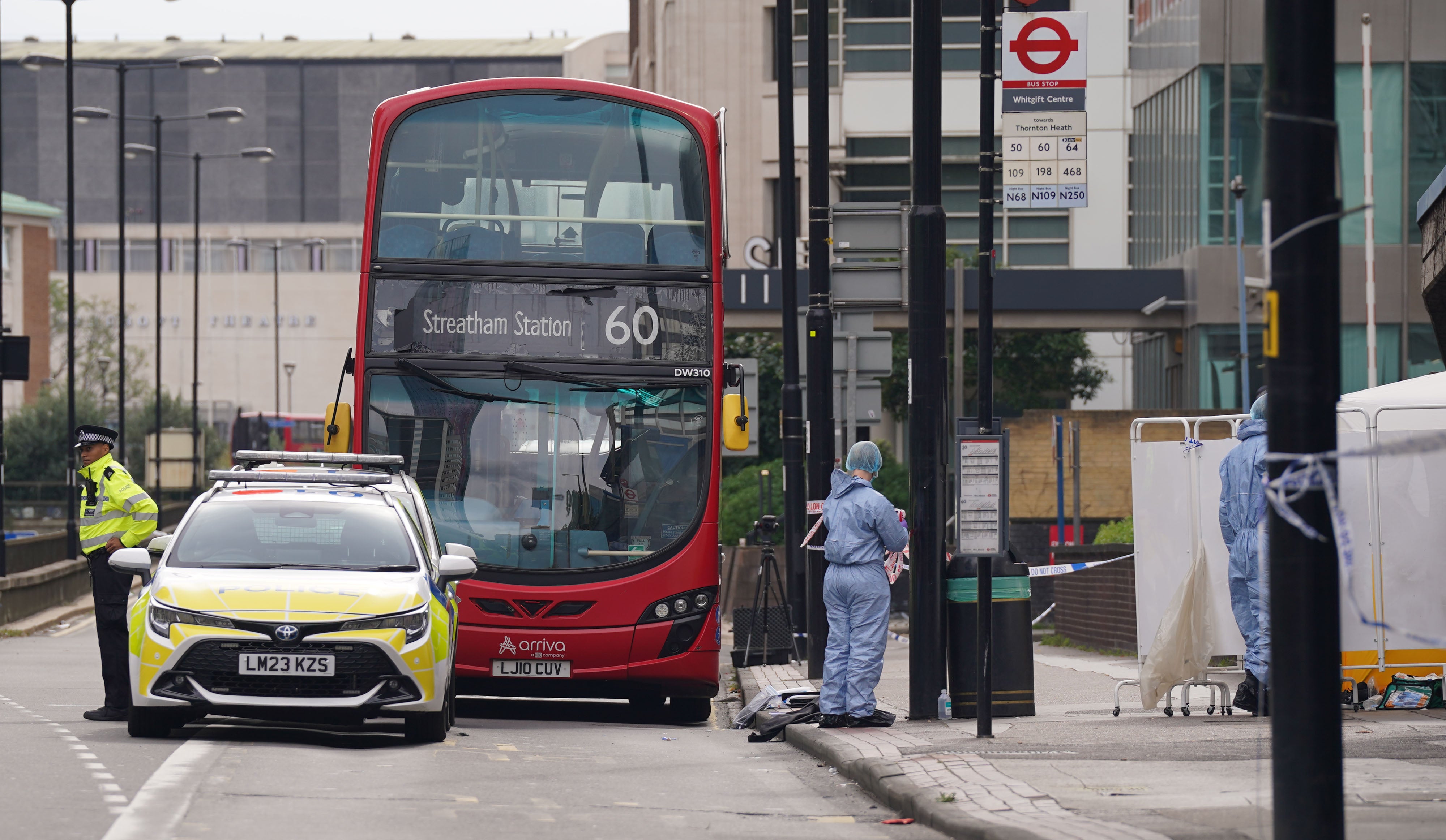 Forensics at the scene around the Route 60 bus