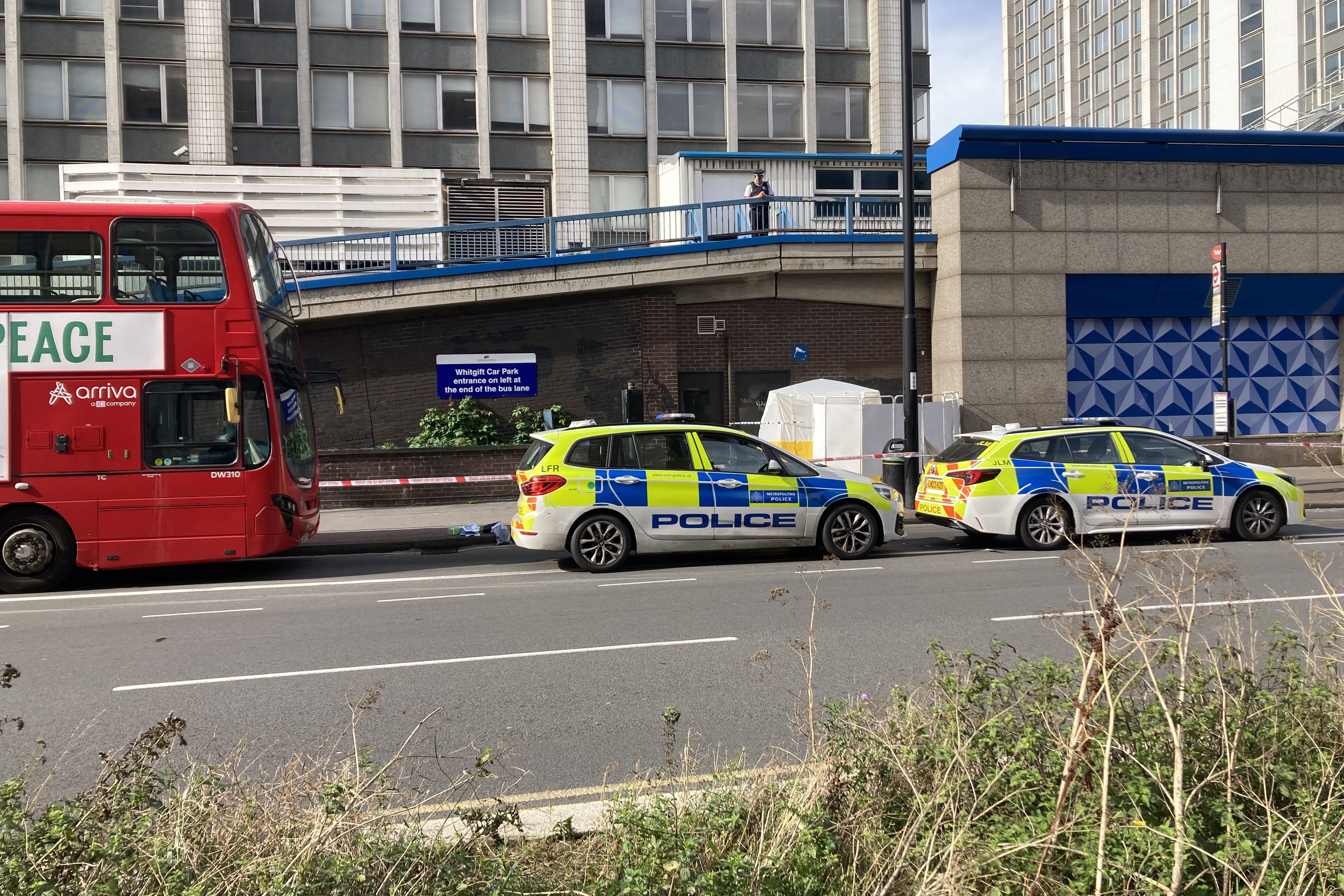 Emergency services at the scene near the Whitgift shopping centre in Croydon, south London after a 15-year-old girl was stabbed to death on Wednesday morning. (Jordan Reynolds/PA)