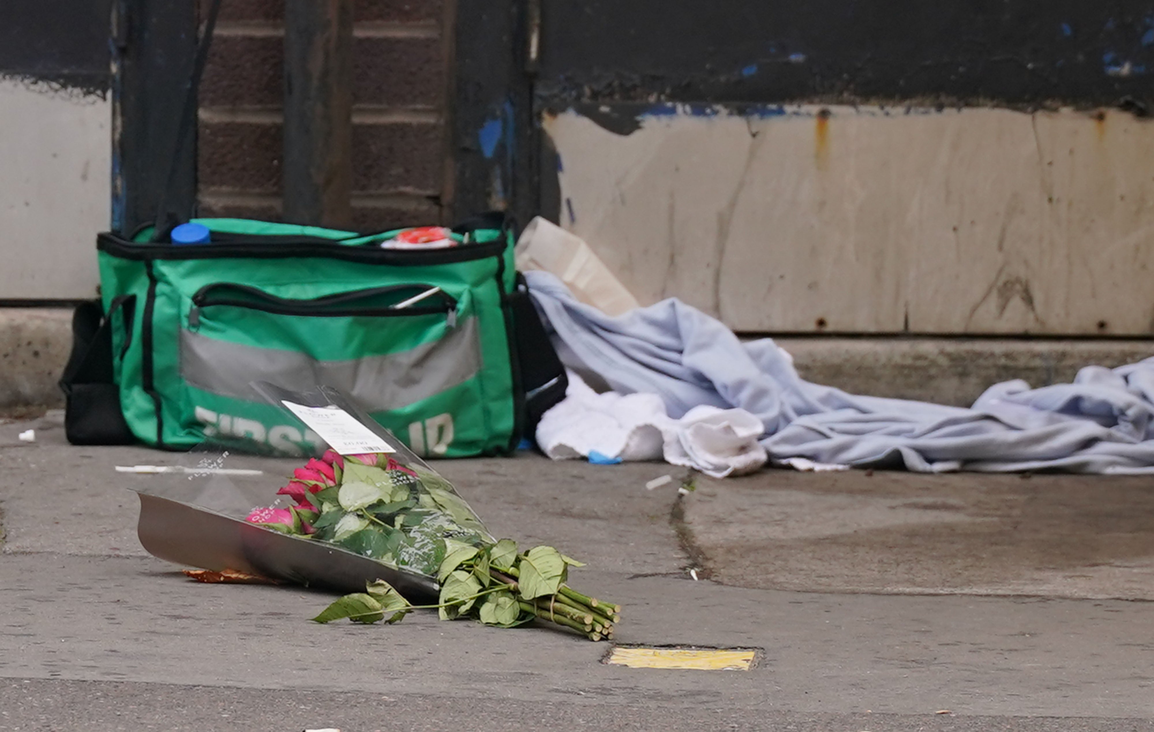 A bouquet of roses left at the scene where the schoolgirl was killed