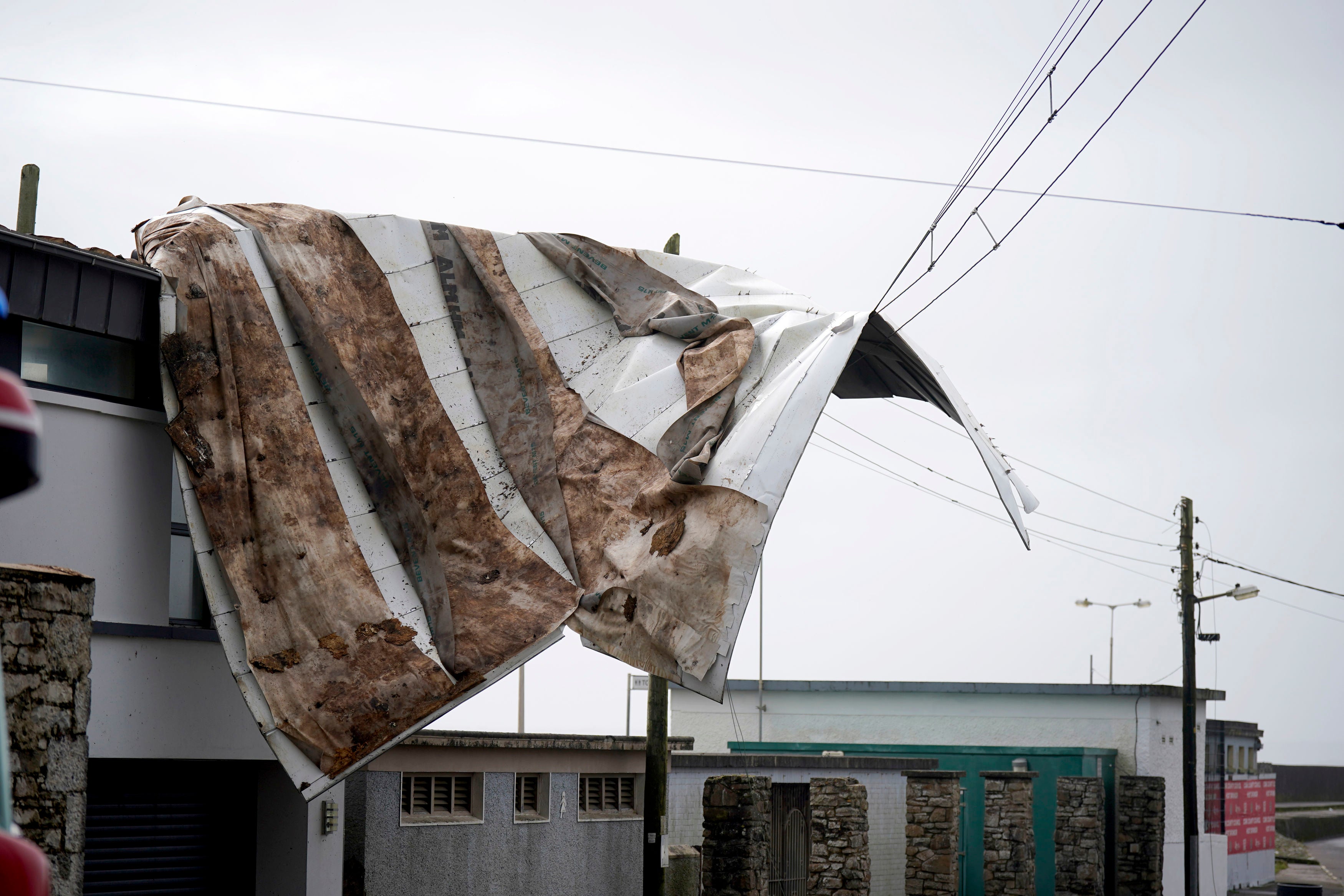 The scene in Youghal, Co Cork, where a roof has been blown from a building