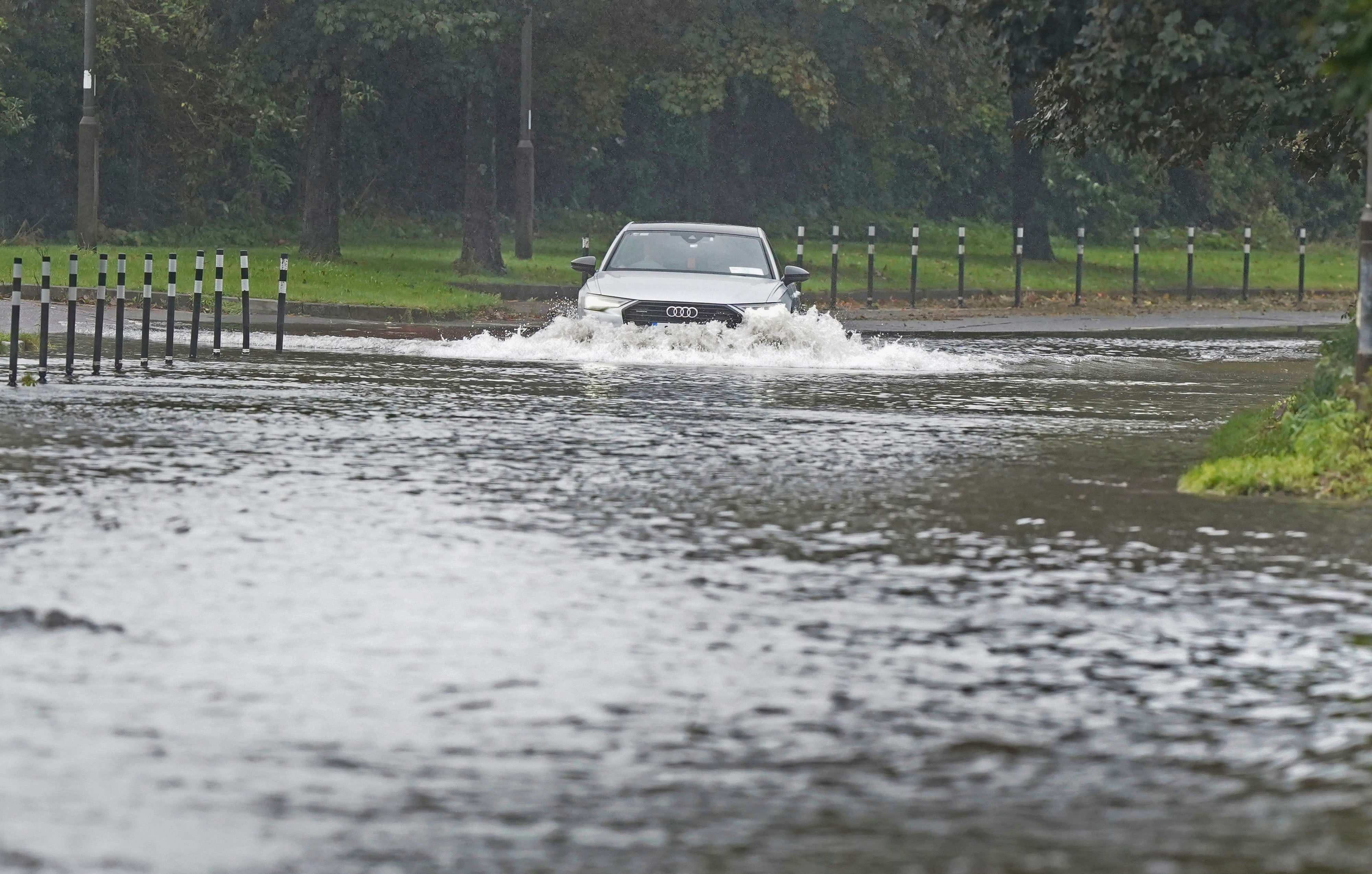 A car driving through floodwater in Cork