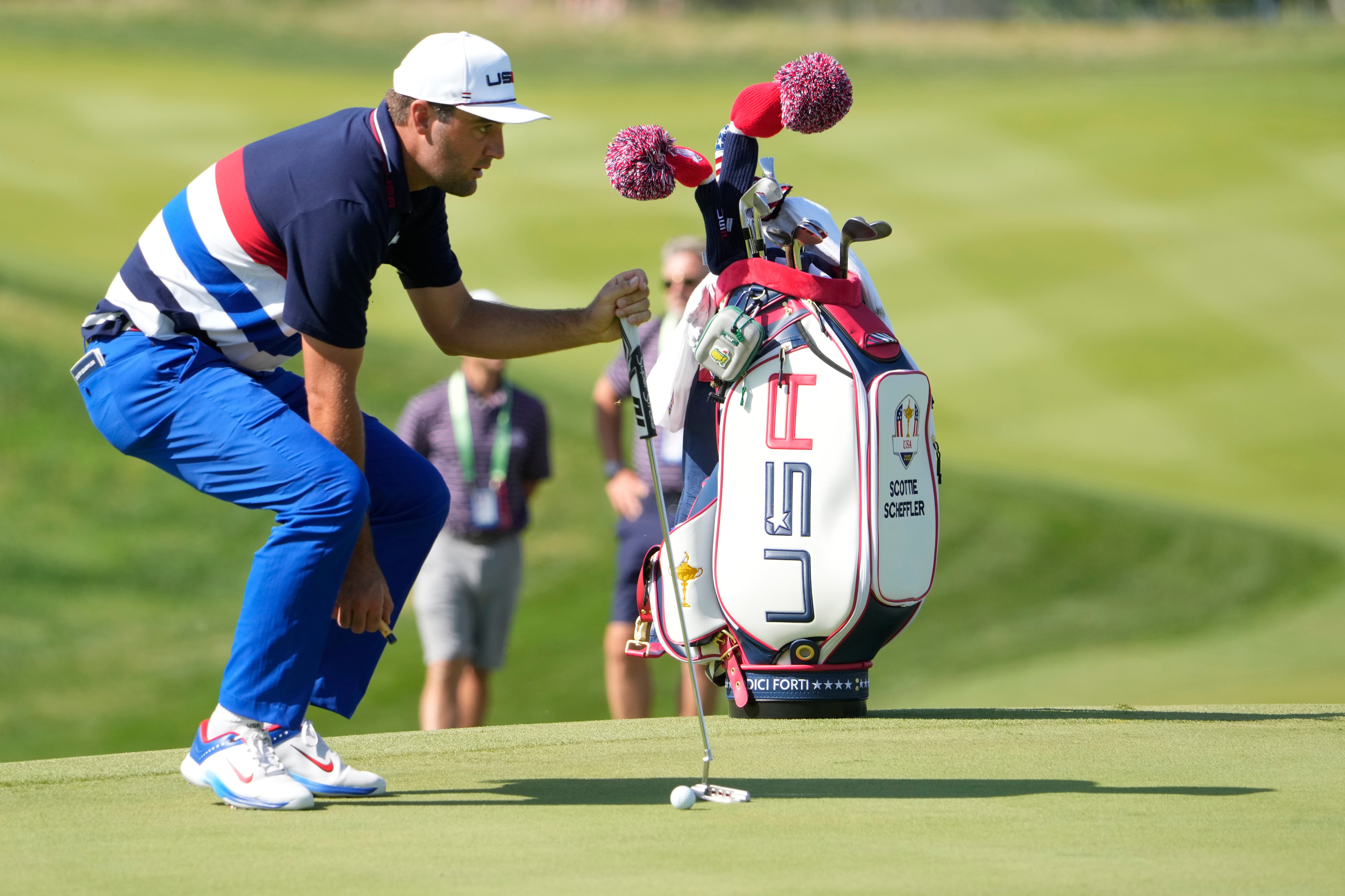 Scottie Scheffler looks at his putt on the 3rd green at Marco Simone during a practice round on Wednesday