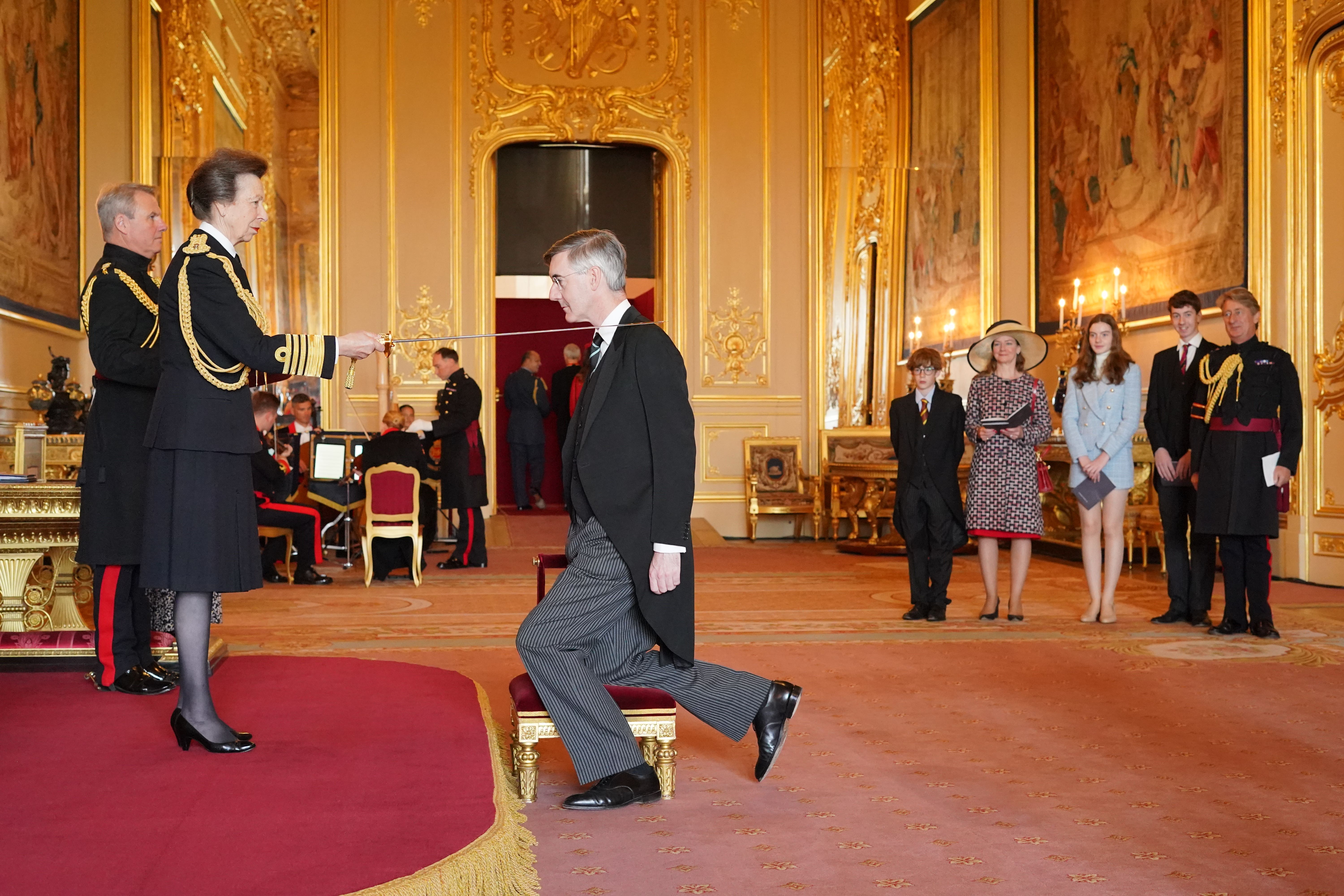 Sir Jacob Rees-Mogg was made a Knight Commander of the British Empire by the Princess Royal at Windsor Castle (Jonathan Brady/PA)