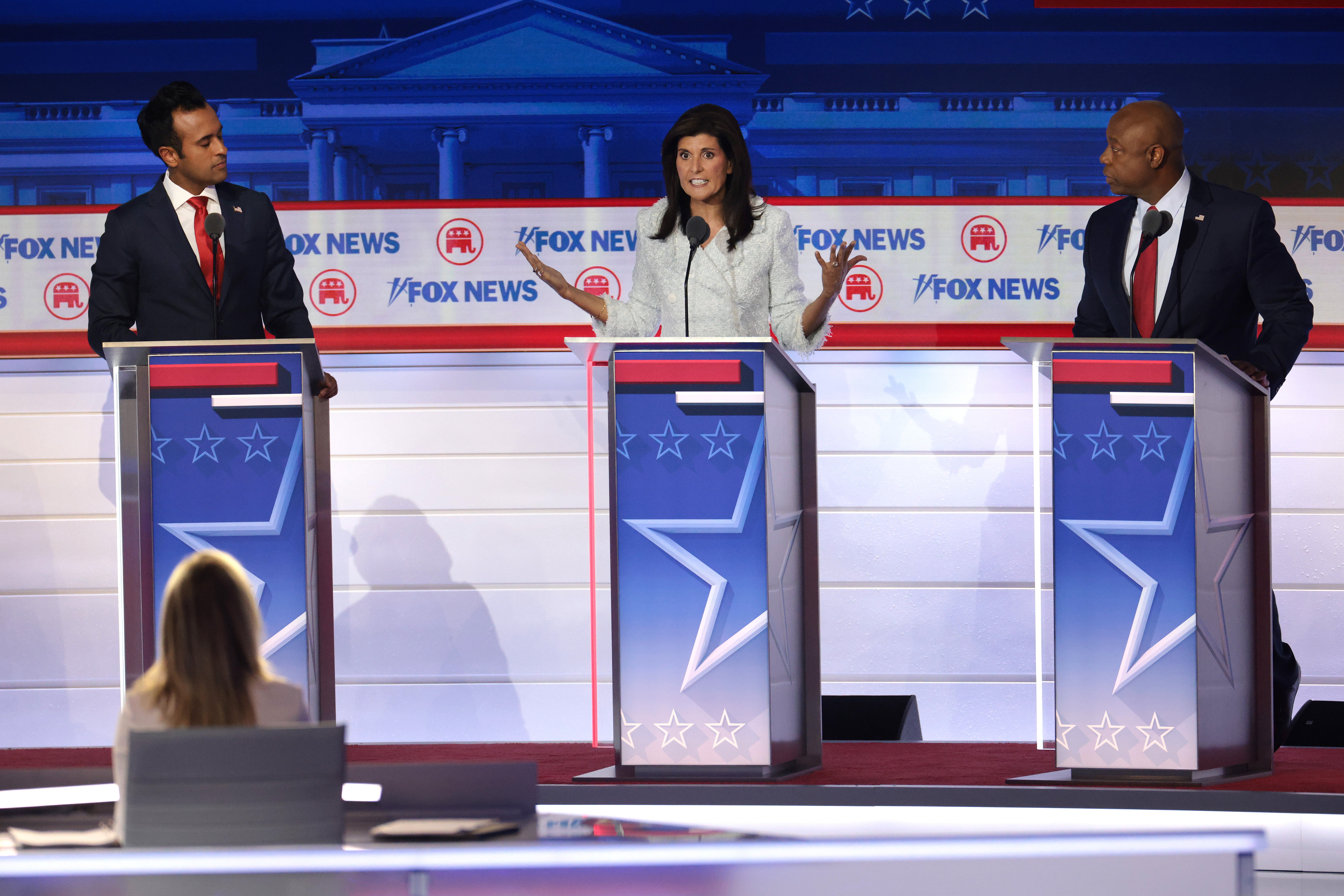 Republican presidential candidates Vivek Ramaswamy, former UN Ambassador Nikki Haley and US Sen. Tim Scott participate in the first GOP debate