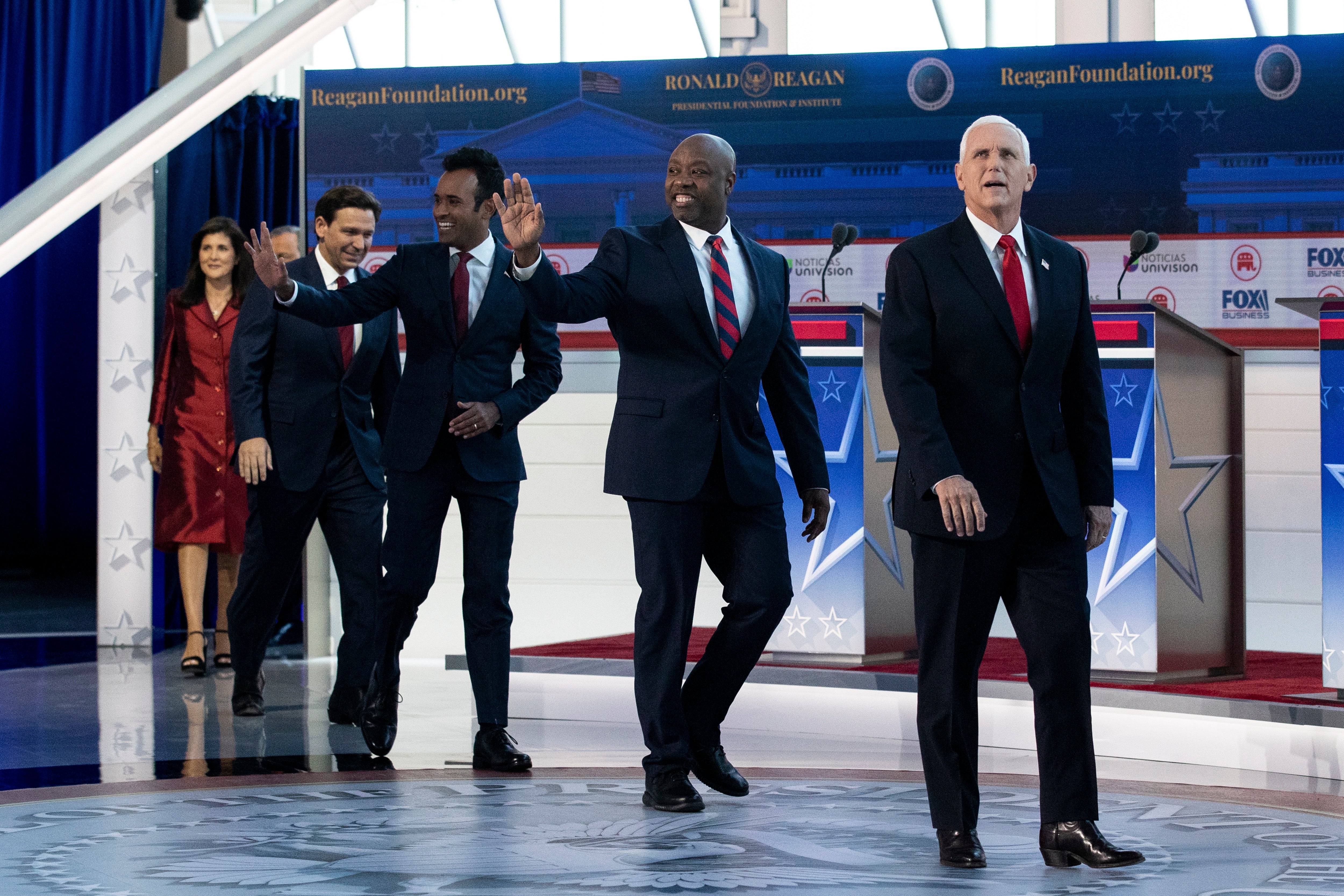 Former South Carolina governor Nikki Haley, Florida governor Ron DeSantis, US entrepreneur Vivek Ramaswamy, South Carolina senator Tim Scott and former Vice President Mike Pence arrive on stage prior to the debate