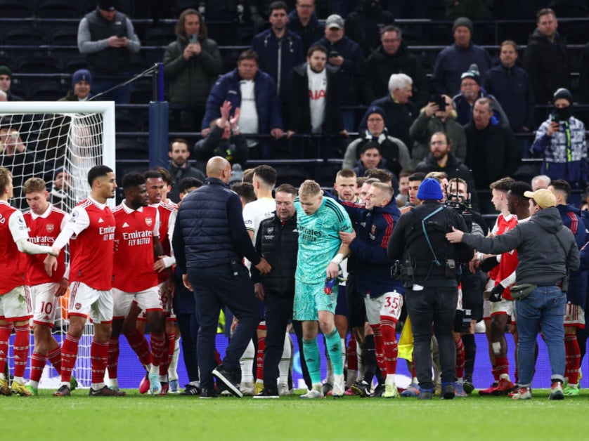 A Tottenham fan was arrested last season when he kicked Arsenal goalkeeper Aaron Ramsdale in the back