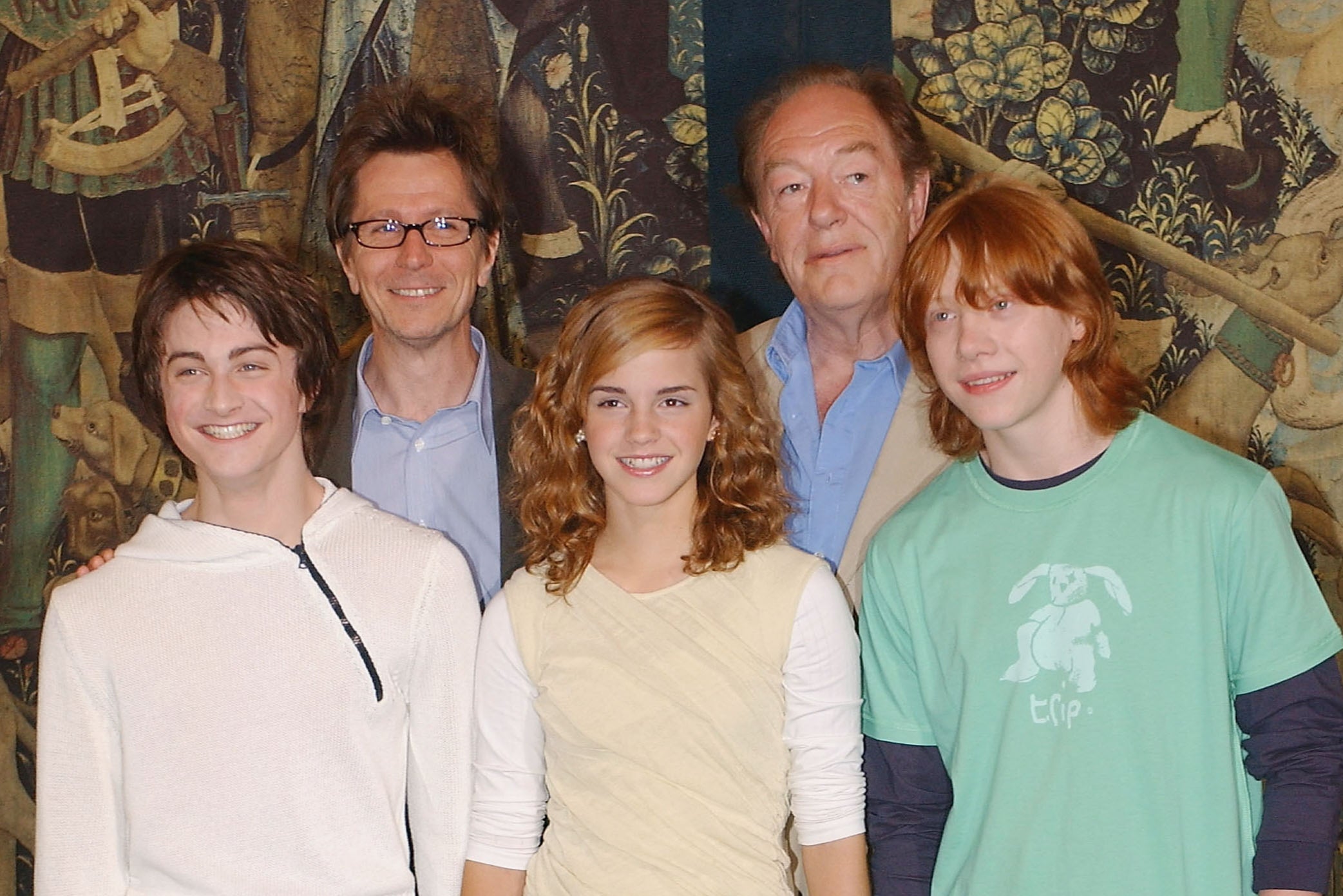 Emma Watson (centre) with the cast of Harry Potter in 2004