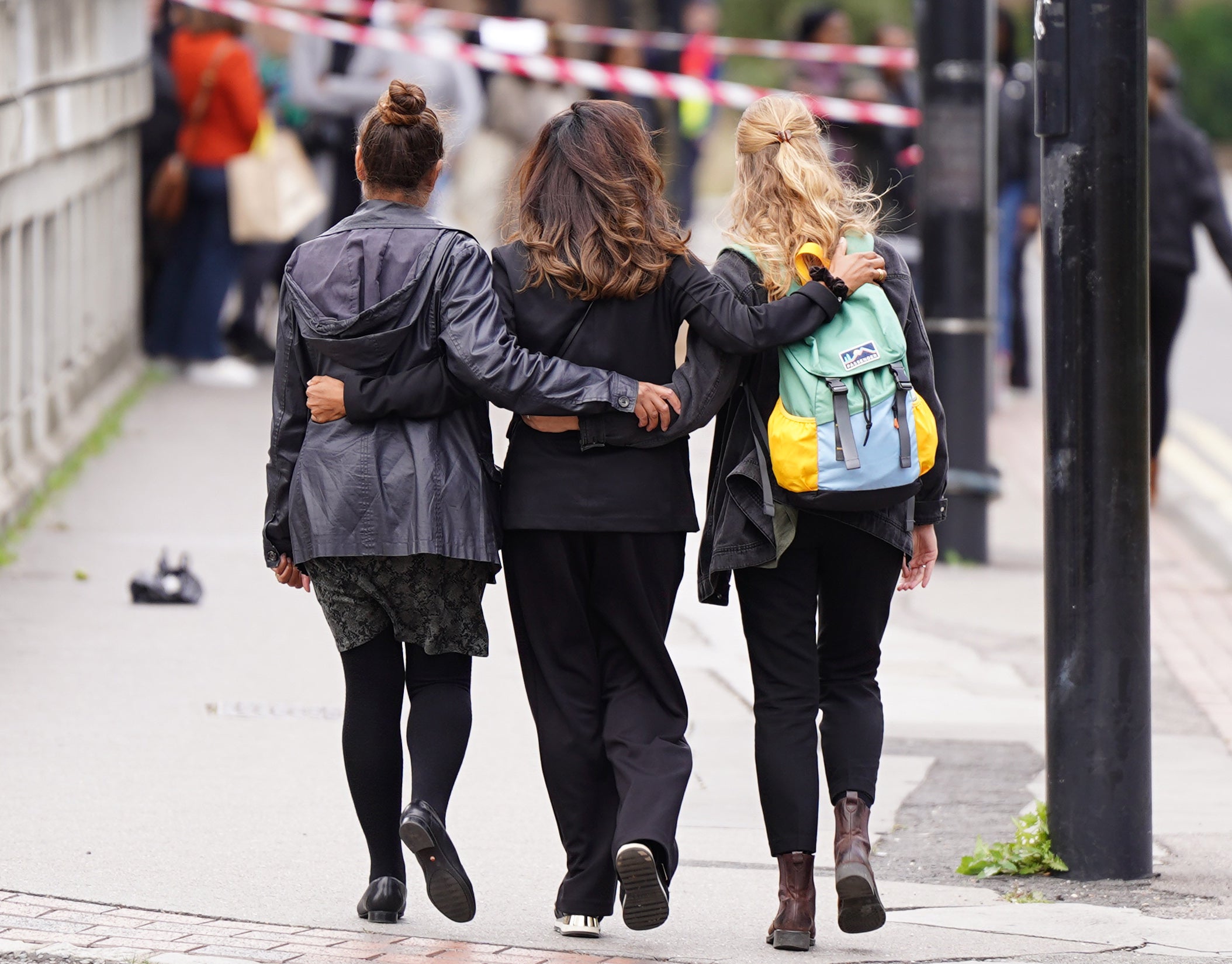 Mourners gather at the scene where Elianne was killed