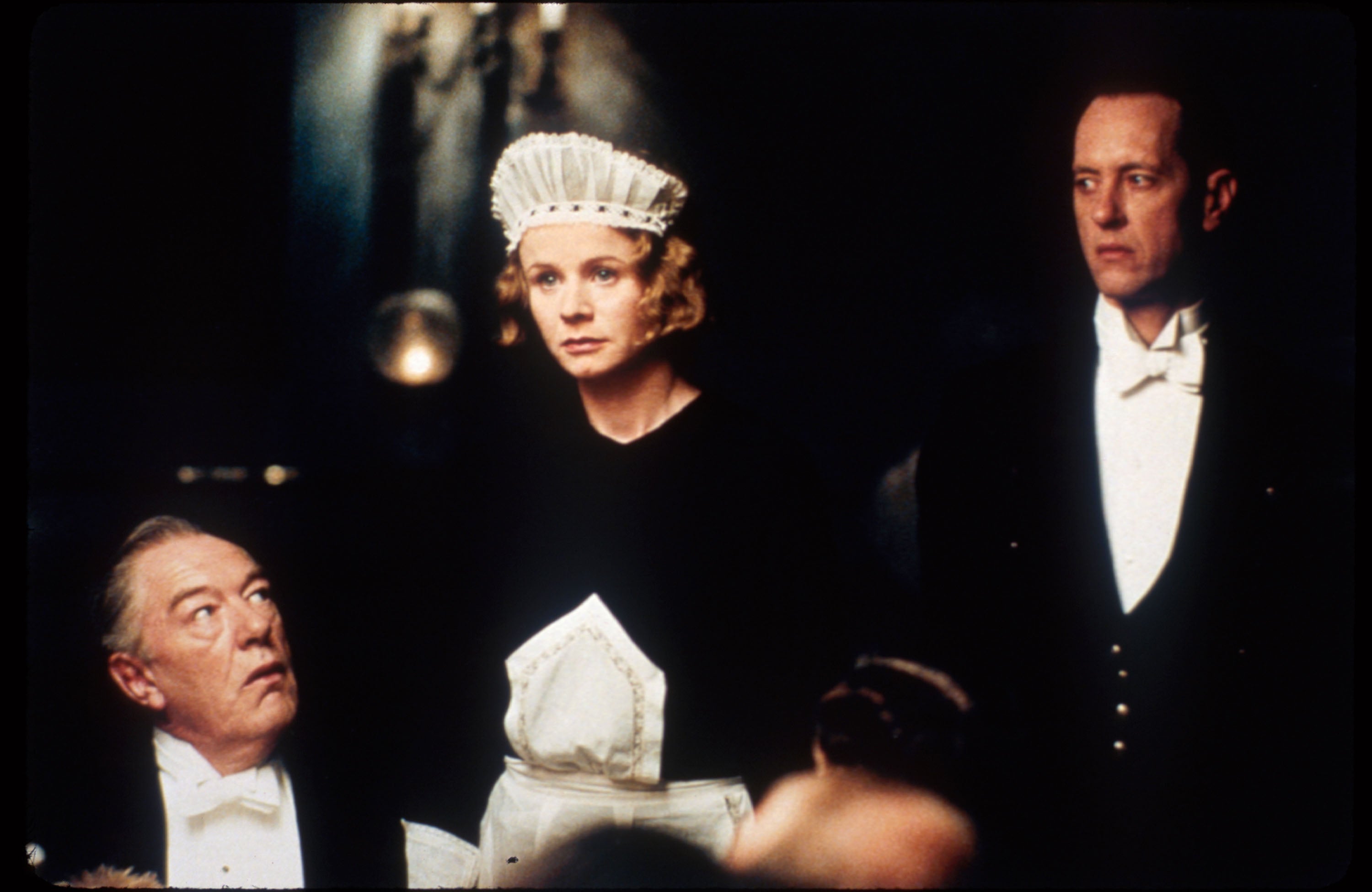 Gambon (left) with Emily Watson and Richard E Grant in ‘Gosford Park’