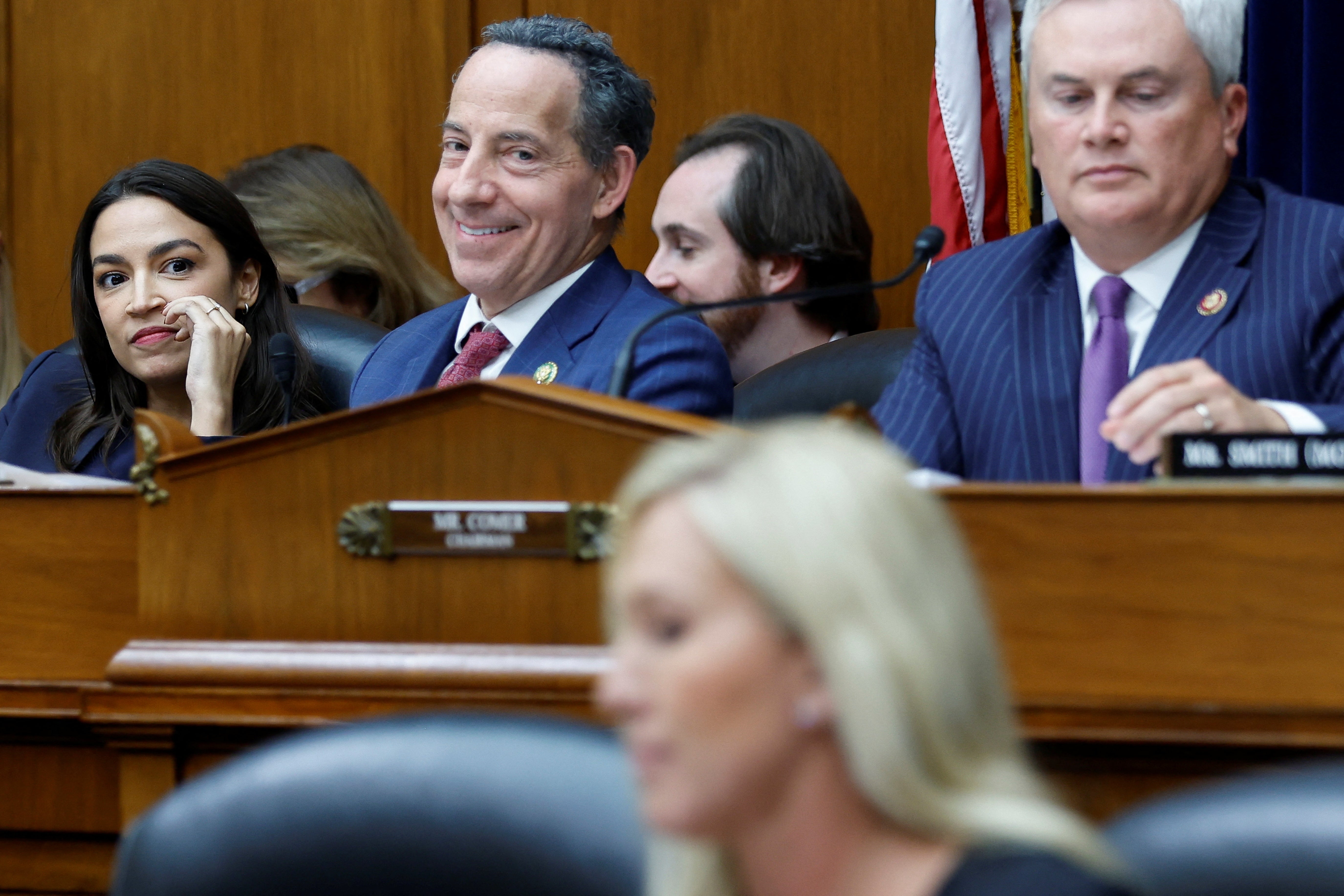 Marlyand congressman Jamie Raskin (centre) and Republican congressman James Comer (right) clashed multiple times during a House hearing on Wednesday