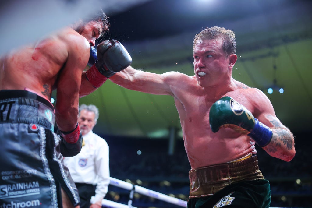 Alvarez punches John Ryder of Great Britain during their May fight in Mexico