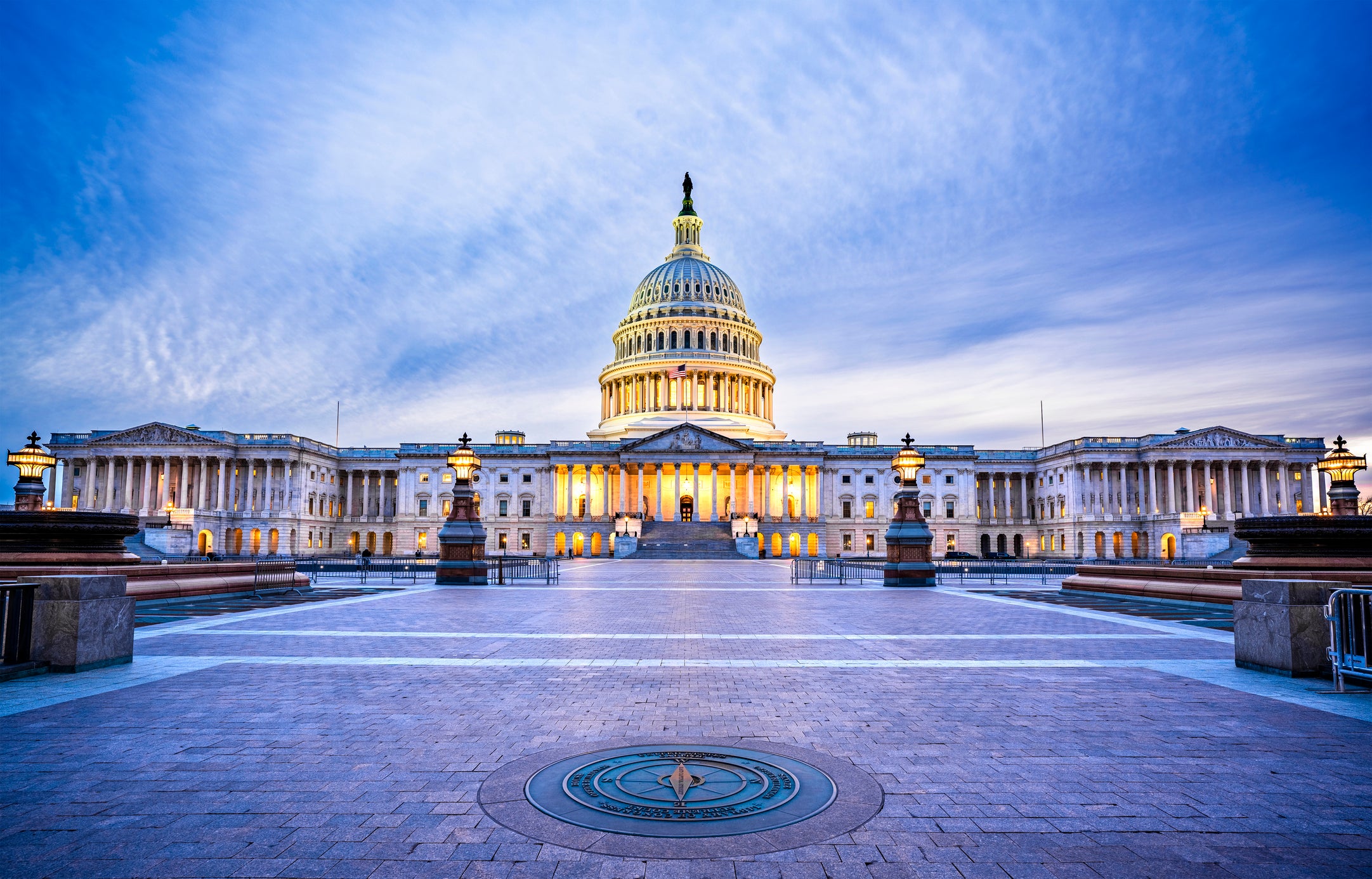 The Capitol Building in Washington, DC., USA lit up in the early evening