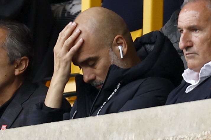 Pep Guardiola’s (centre) Manchester City suffered defeat at Wolves on Saturday (Nigel French/PA)