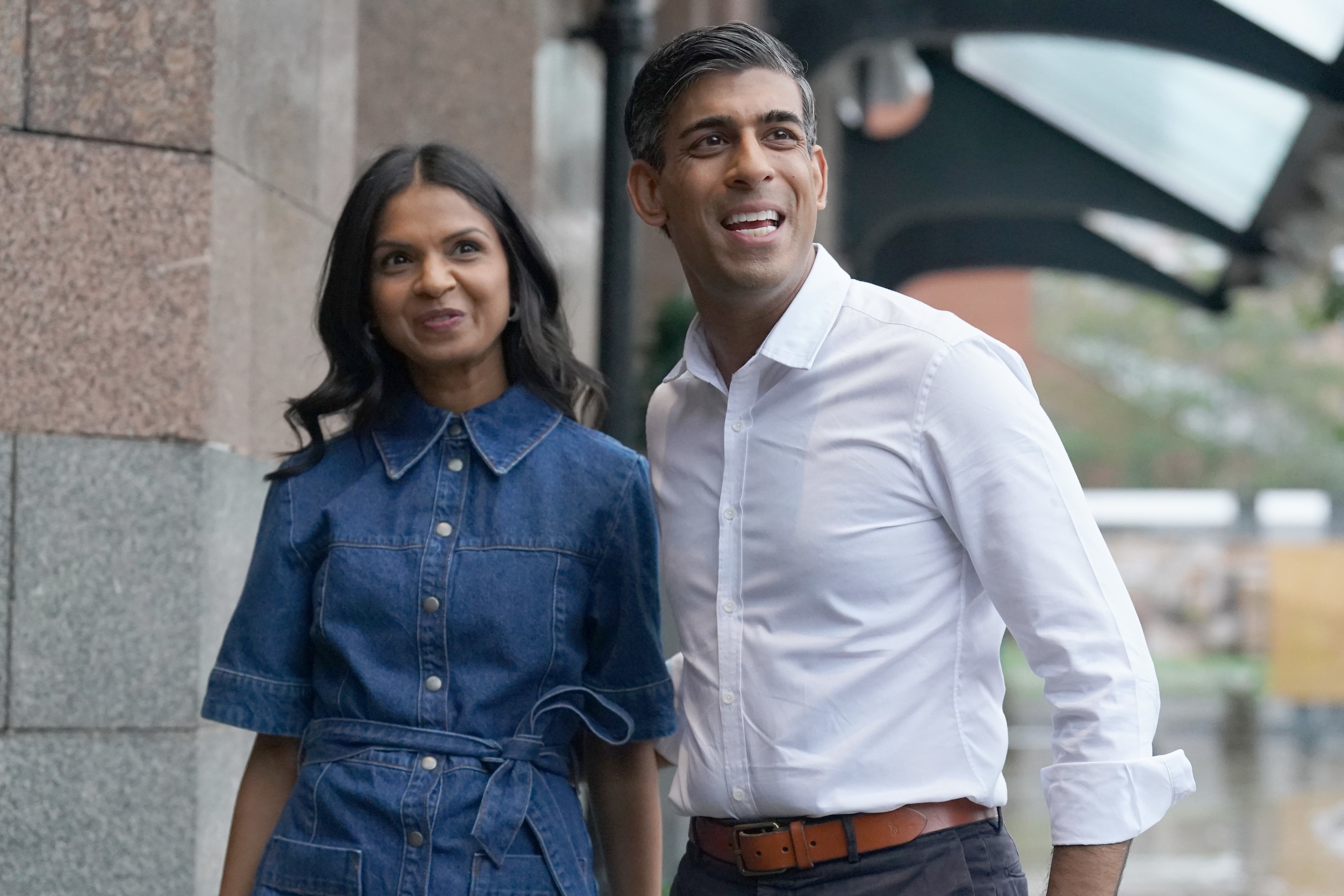 Prime Minister Rishi Sunak and wife Akshata Murty arriving in Manchester on the eve of the Conservative Party conference (Stefan Rousseau/PA)