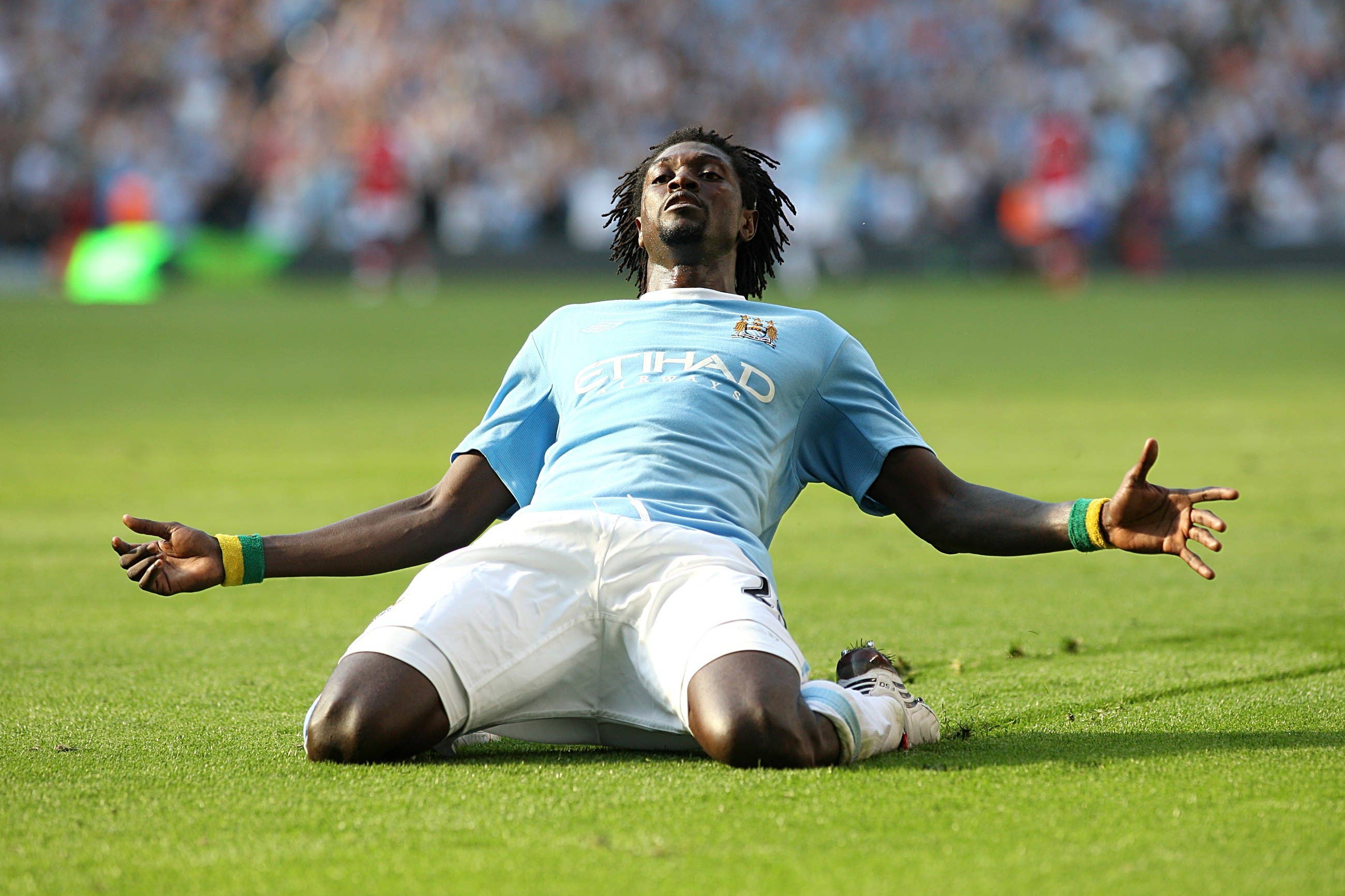 Emmanuel Adebayor ran the full length of the pitch for his celebration (Nick Potts/PA)