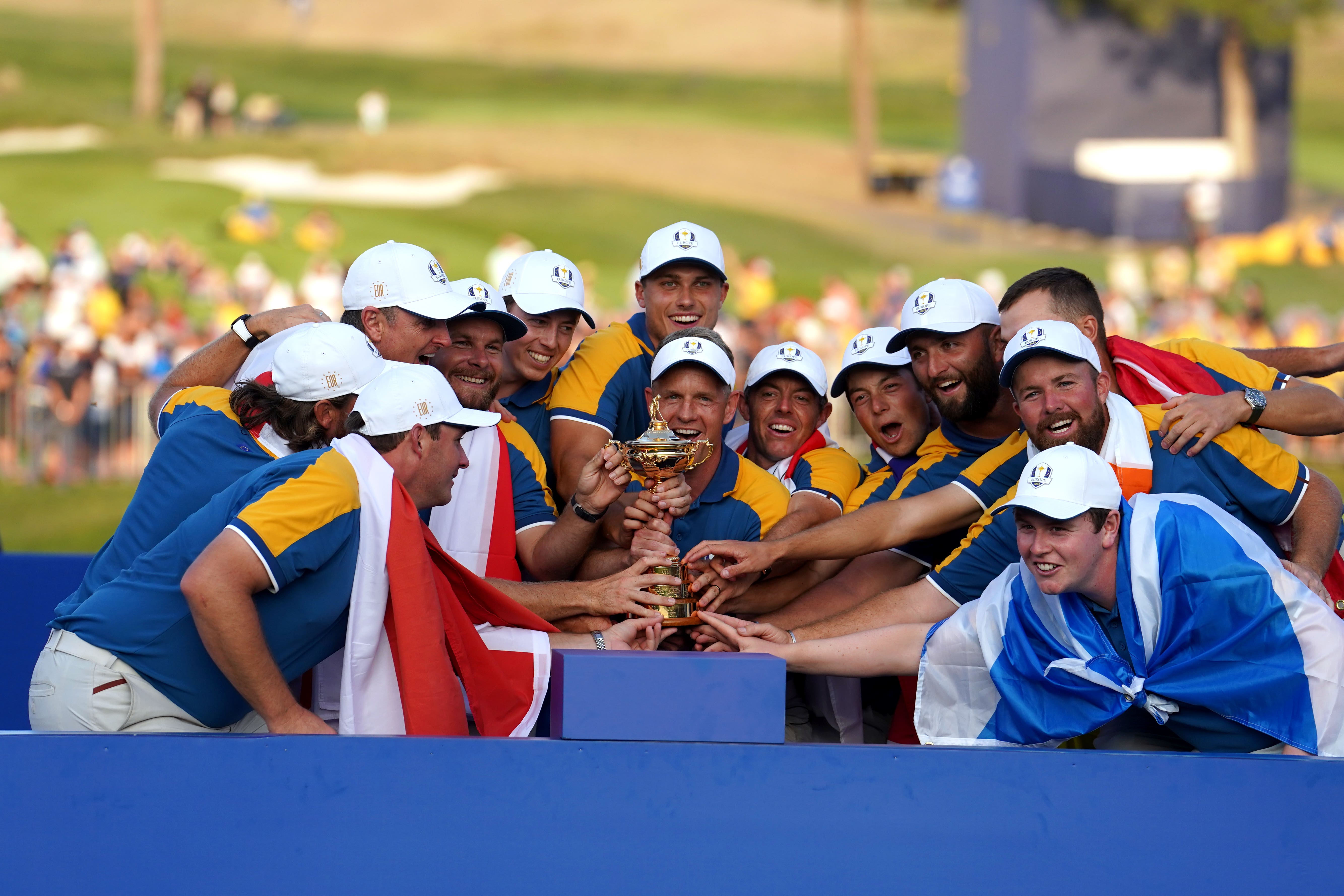 Team Europe captain Luke Donald lifts the Ryder Cup (David Davies/PA)