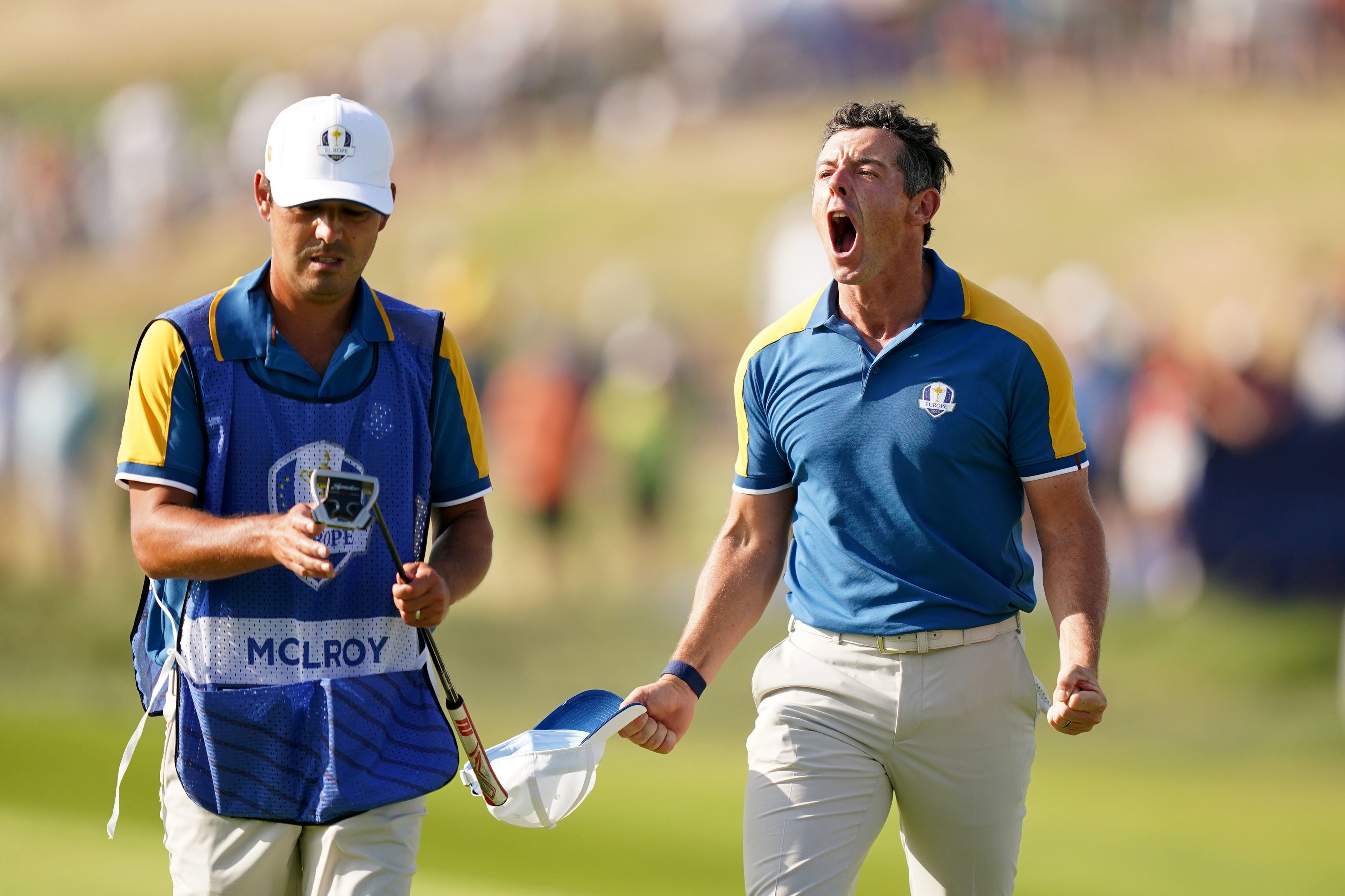 McIlroy celebrates his shot to the 17th green