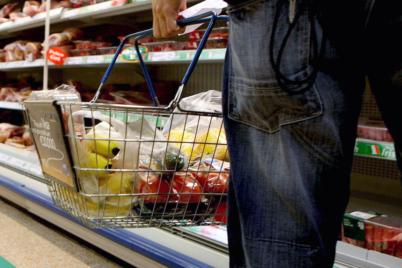 Shoppers appear to be buying more processed food and ready meals to save money, a survey shows (PA)