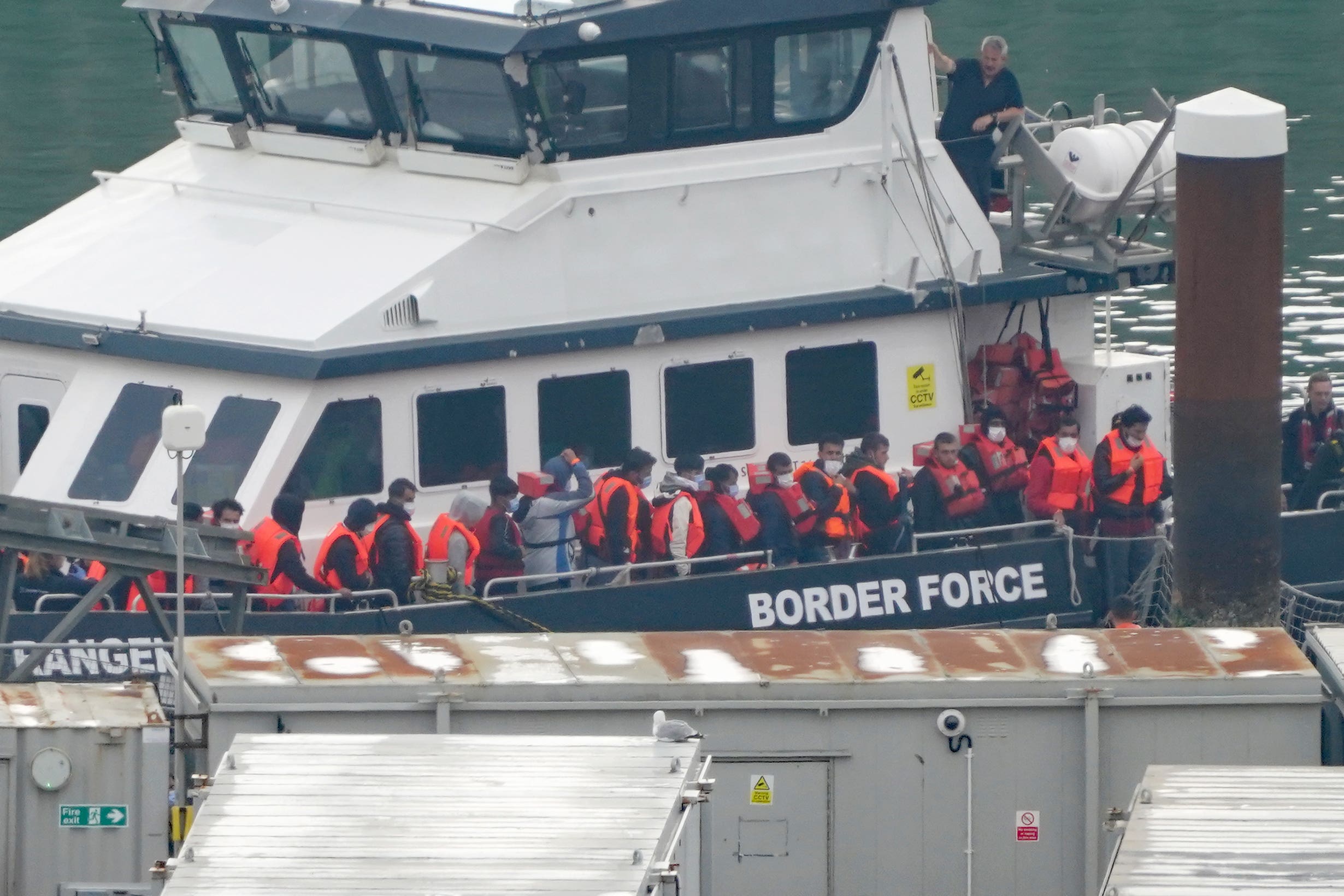 A group of people thought to be migrants are brought in to Dover, Kent (Gareth Fuller/PA)