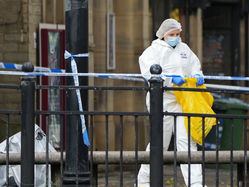 Police activity outside the Victoria Theatre in Fountain Street, near to the scene of a triple stabbing in Commercial Street