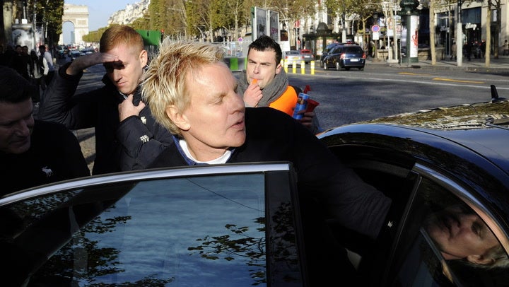 File image: Mike Jeffries, then-CEO of US clothing retailer Abercrombie & Fitch, leaves the store on the Champs Elysees avenue in Paris on 27 October 2012