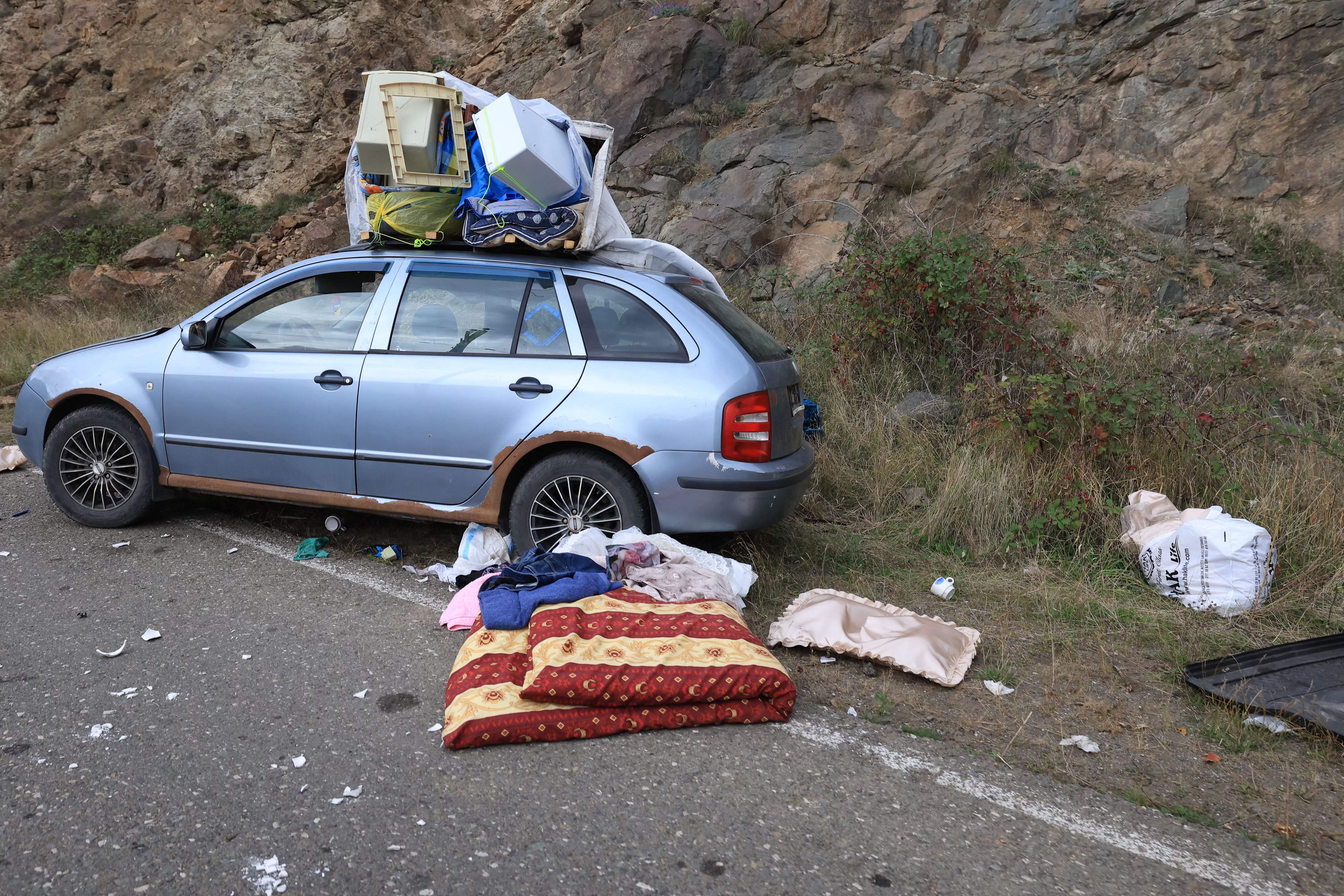 An abandoned car left by fleeing Armenians in Nagorno-Karabakh