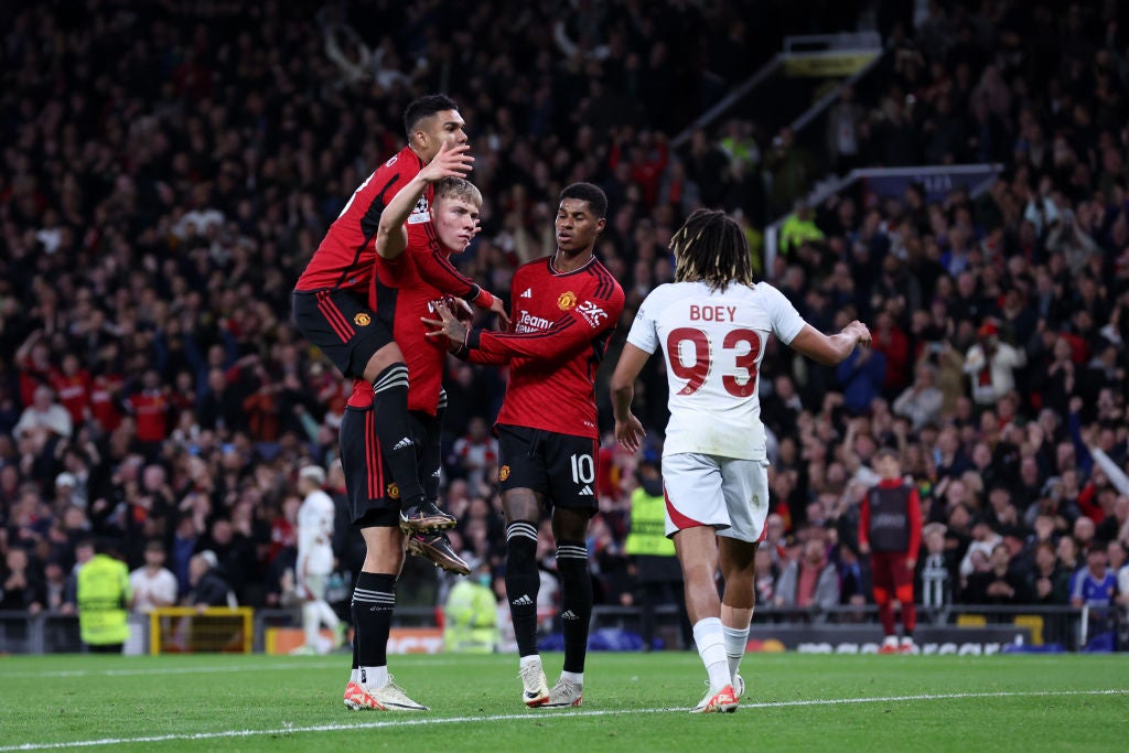 Hojlund is congratulated by teammates after scoring his second goal