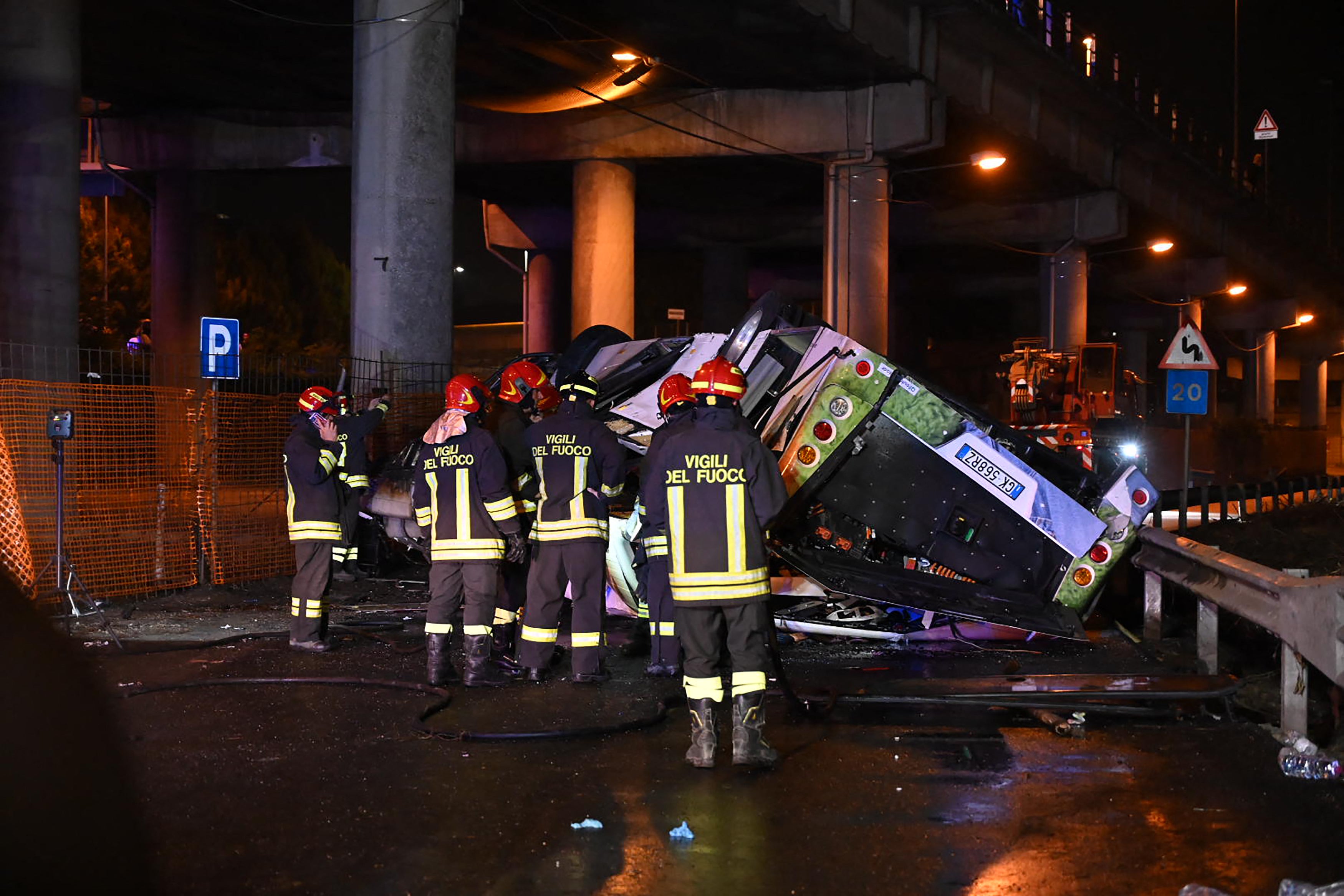 At least 21 dead after passenger bus plunges off overpass near Venice