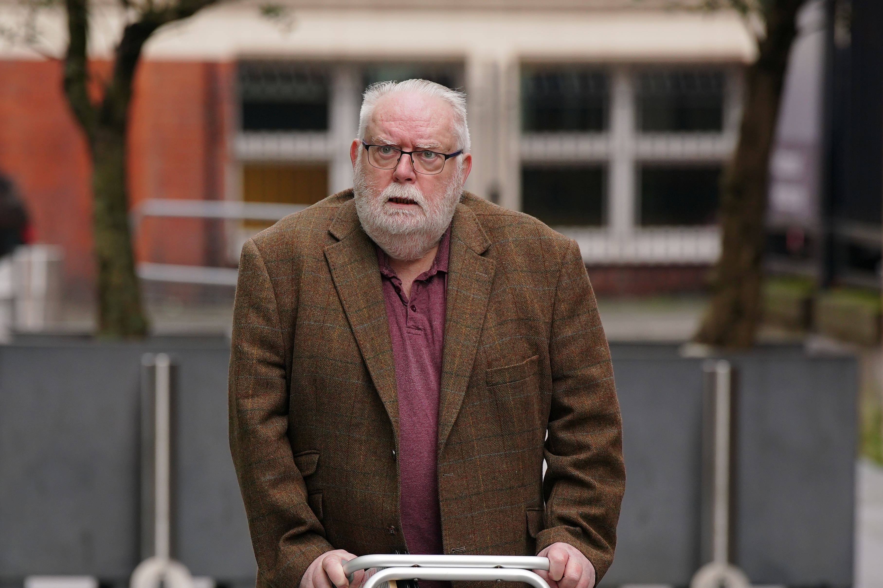 Former Co-op Bank boss Paul Flowers arrives at Manchester Magistrates’ Court where he is accused of fraud by abusing his position (