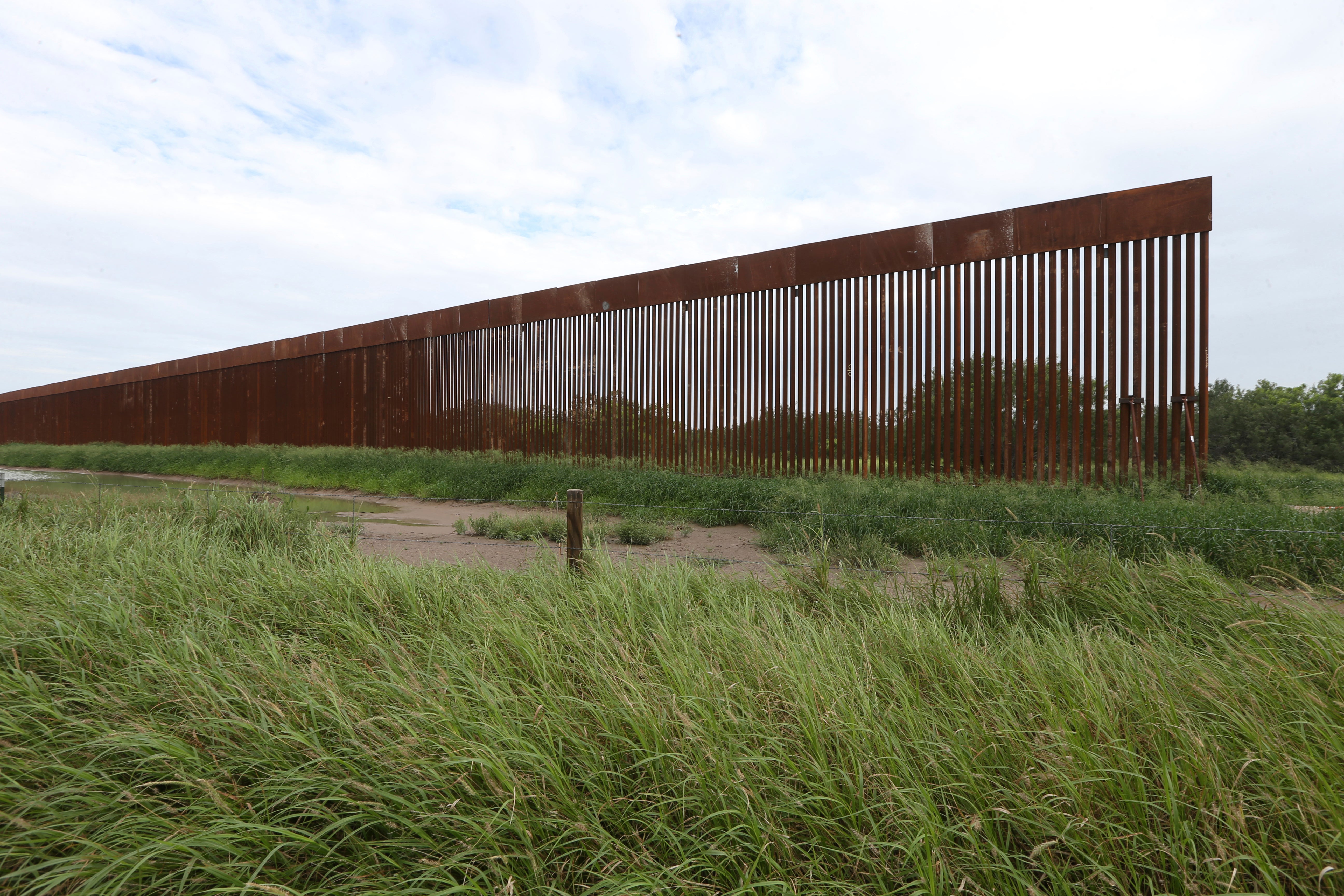 The Biden administration campaigned on stopping wall construction, but ended up pushing forward with plans to extend the border wall anyway in places like Starr County, Texas (pictured)